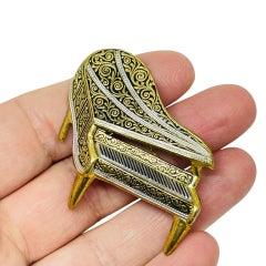 Vintage SPAIN damascene gold tone black piano designer brooch