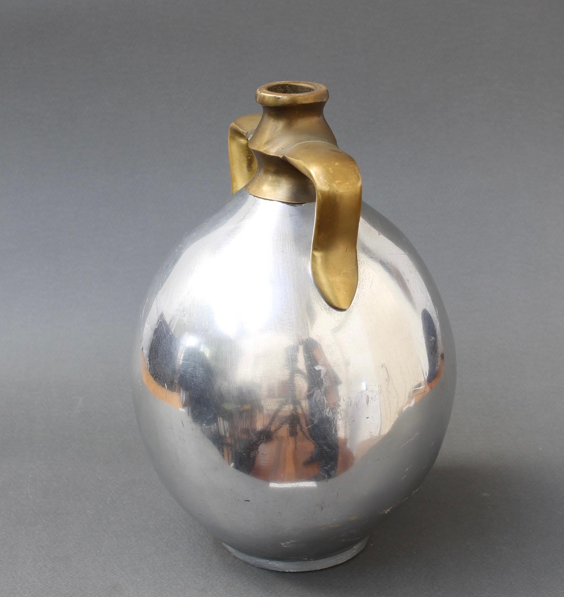 Aluminium and brass brutalist style vase with handles by Alfonso Marquez (in the style of David Marshall). Very weighty and wonderfully tactile, this piece may be used as a flower vase or simply as an item of decor for the home or workplace. The