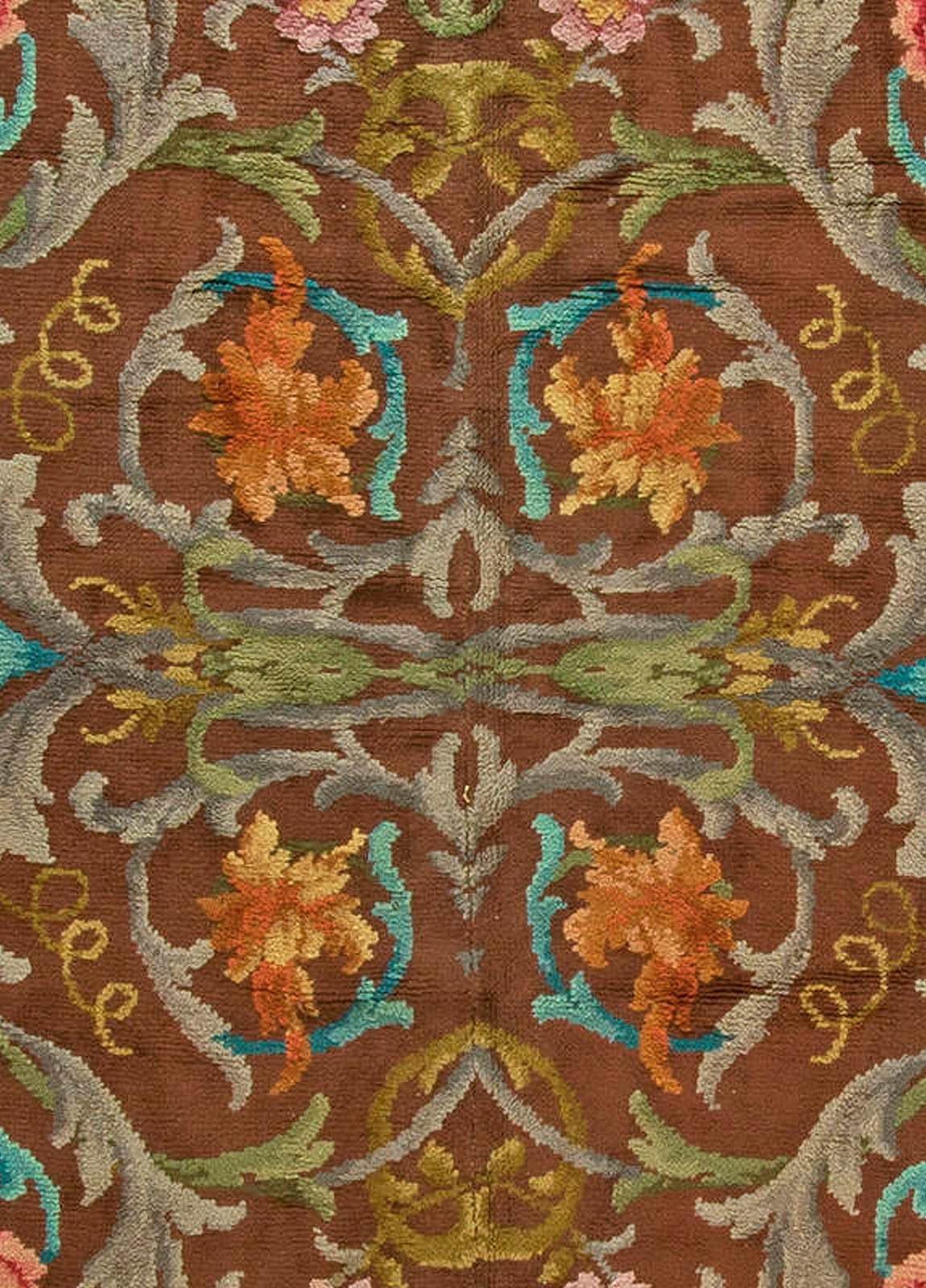 Vintage Spanish Botanic handmade wool rug
Size: 12'0