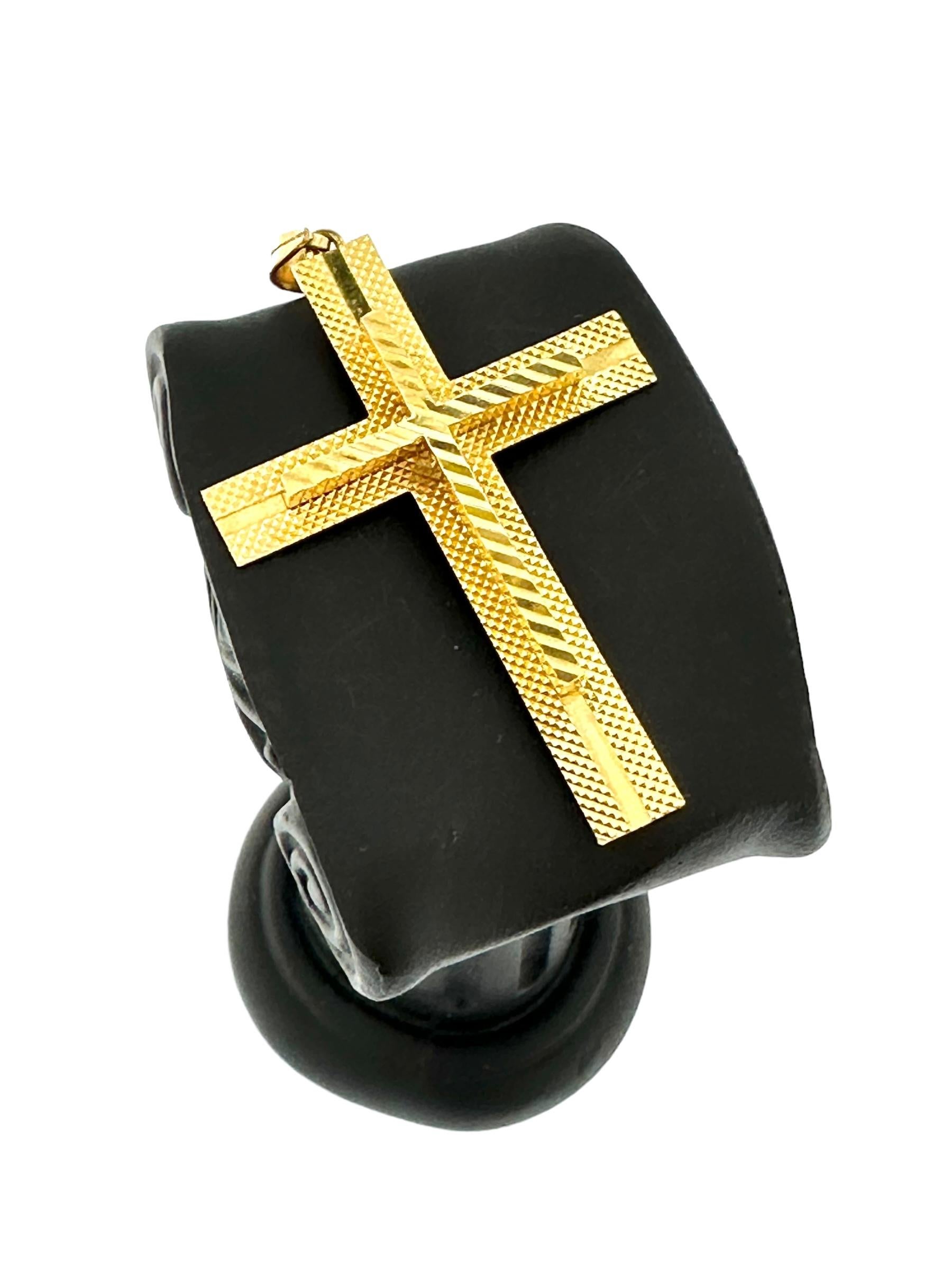 The Vintage Spanish Cross in 18 karat Yellow Gold is a striking piece of jewelry that carries both religious symbolism and artistic flair. Crafted from luxurious 18-karat yellow gold, this cross pendant exudes warmth and elegance.

At the center of
