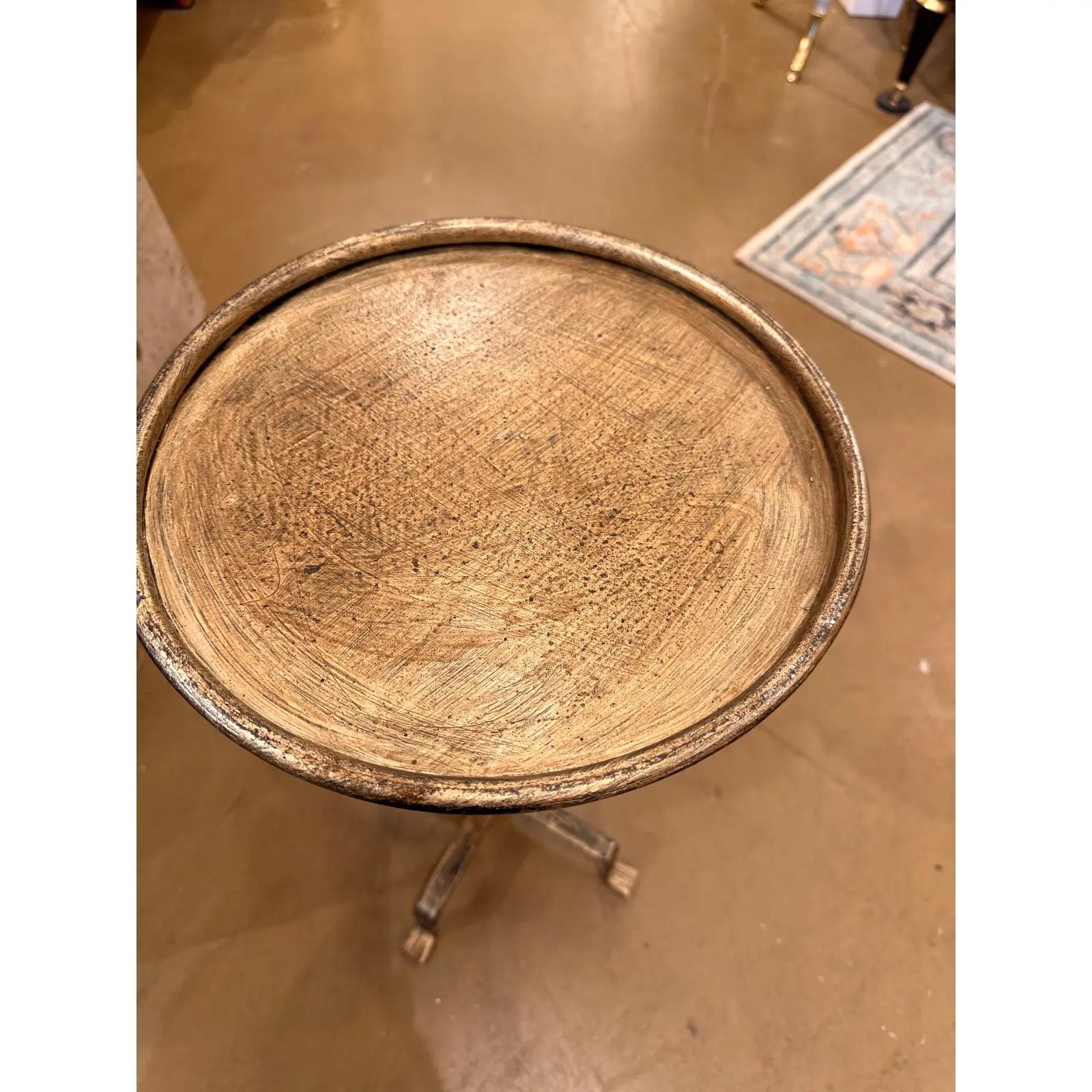 This is wonderful little Spanish made wrought iron drink table with an antiqued gold finish.Contemporary yet antique inspired style for any decor aesthetic. We have 5 of these listed all have their own unique design, giving them such wonderful