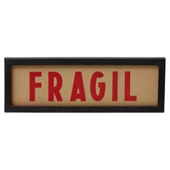 Vintage Spanish Framed Poster – “FRAGIL” in Modern Typography, Circa 1950