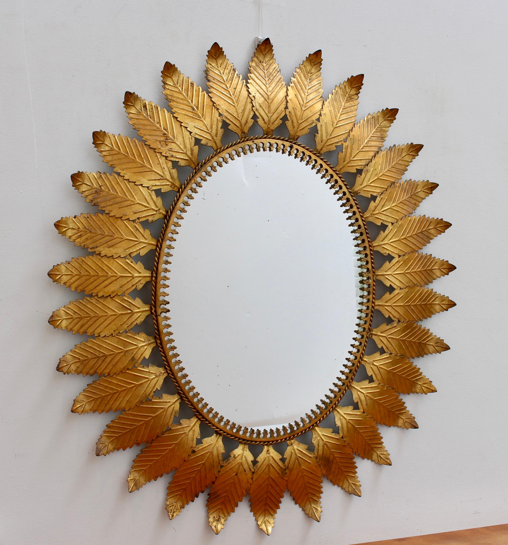 Vintage Spanish Gilt Metal Sunburst Mirror with Leaf Motif (circa 1970s) In Good Condition For Sale In London, GB