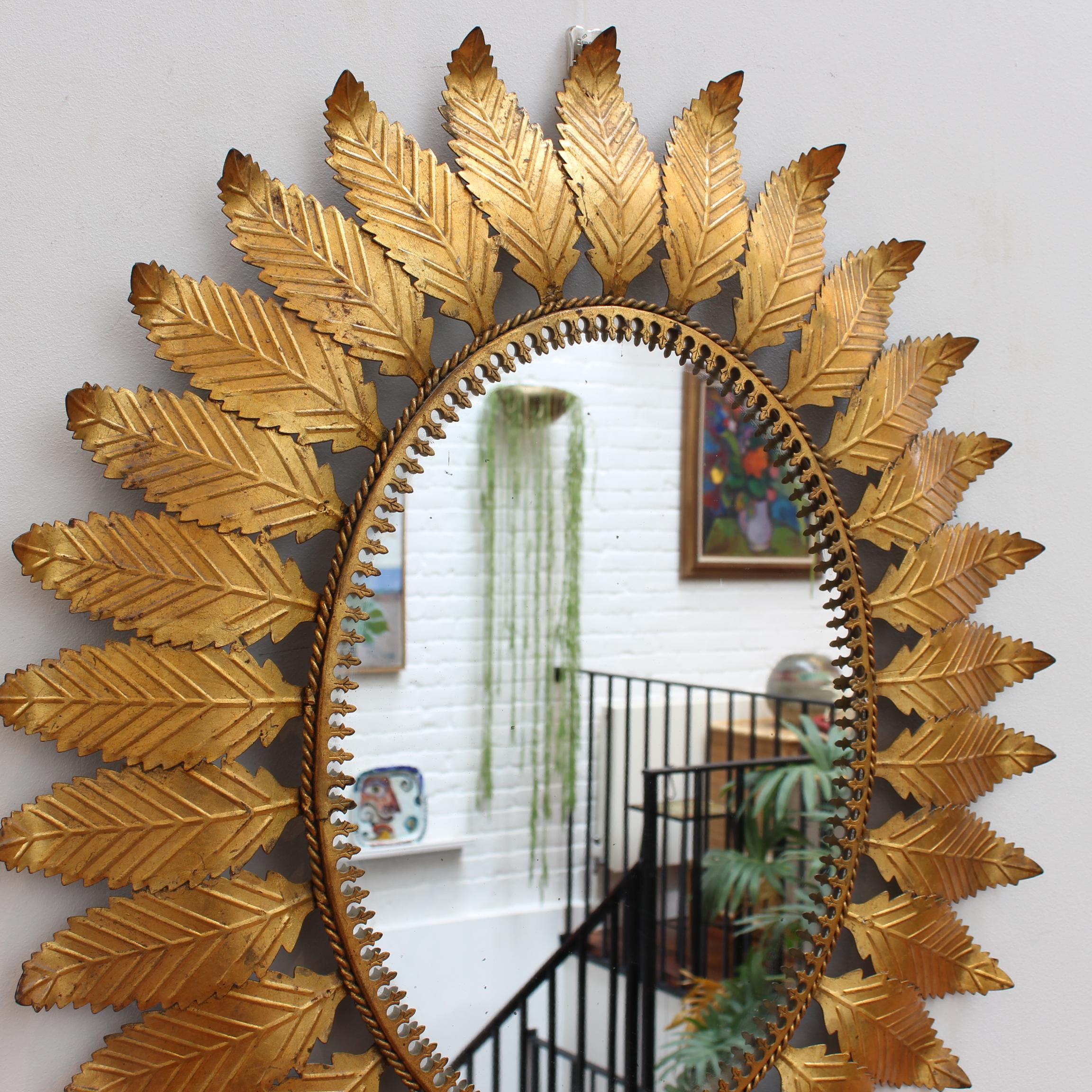 Late 20th Century Vintage Spanish Gilt Metal Sunburst Mirror with Leaf Motif (circa 1970s) For Sale