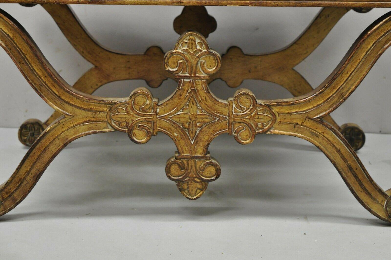 Vintage Spanish Regency Carved Wood X-Frame Gold Upholstered Stool Bench In Distressed Condition For Sale In Philadelphia, PA