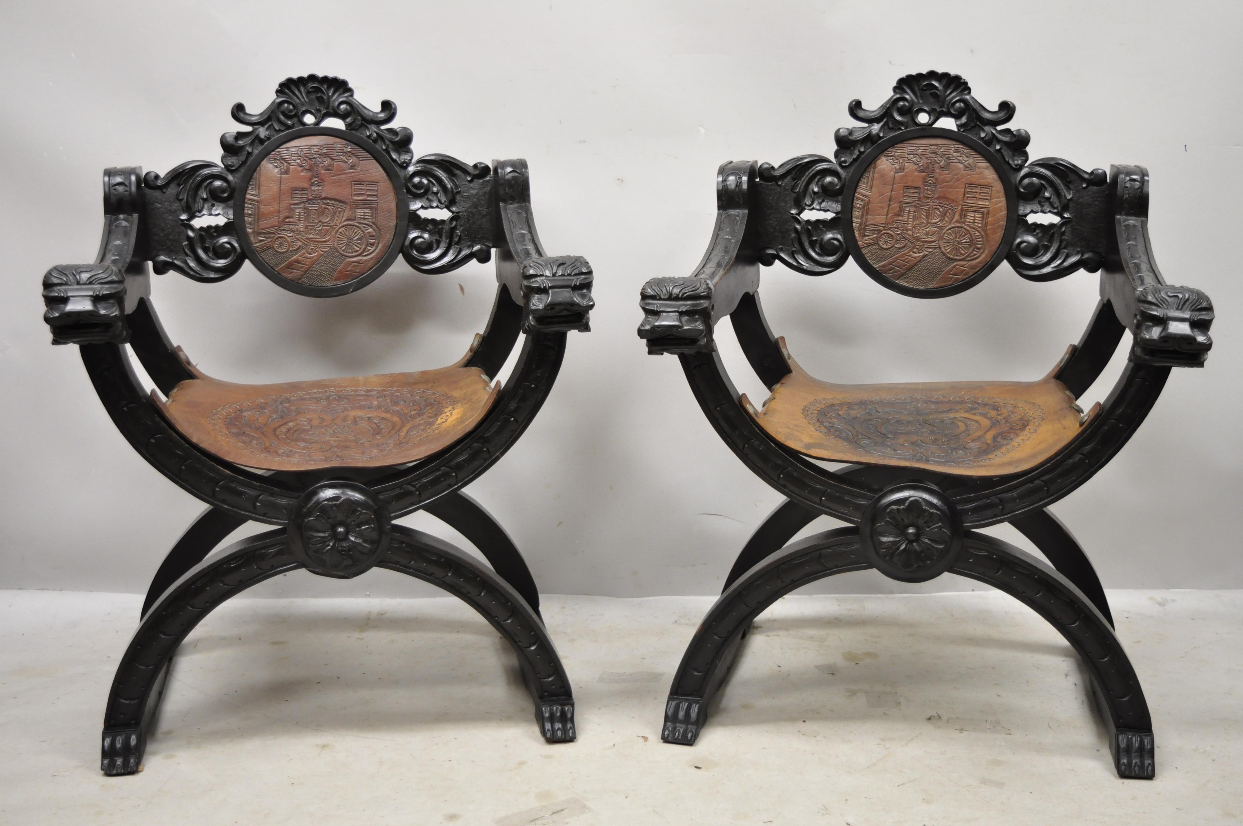 Vintage Spanish Renaissance brown leather lion carved Savonarola Throne chairs - a pair. Item features embossed detail leather sling seat and back, lion carved armrests, paw feet, solid wood construction, nicely carved details, very nice vintage