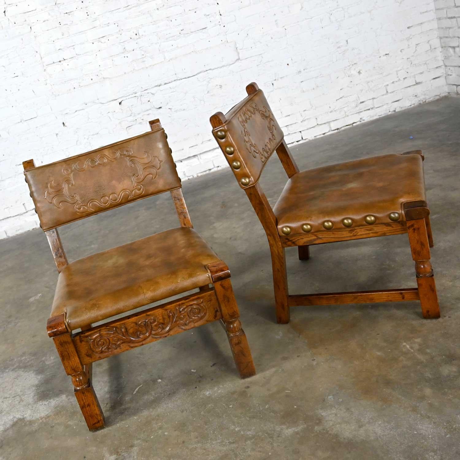 Vintage Spanish Revival Oak Pair of Chairs with Tooled Cognac Faux Leather Seat For Sale 1