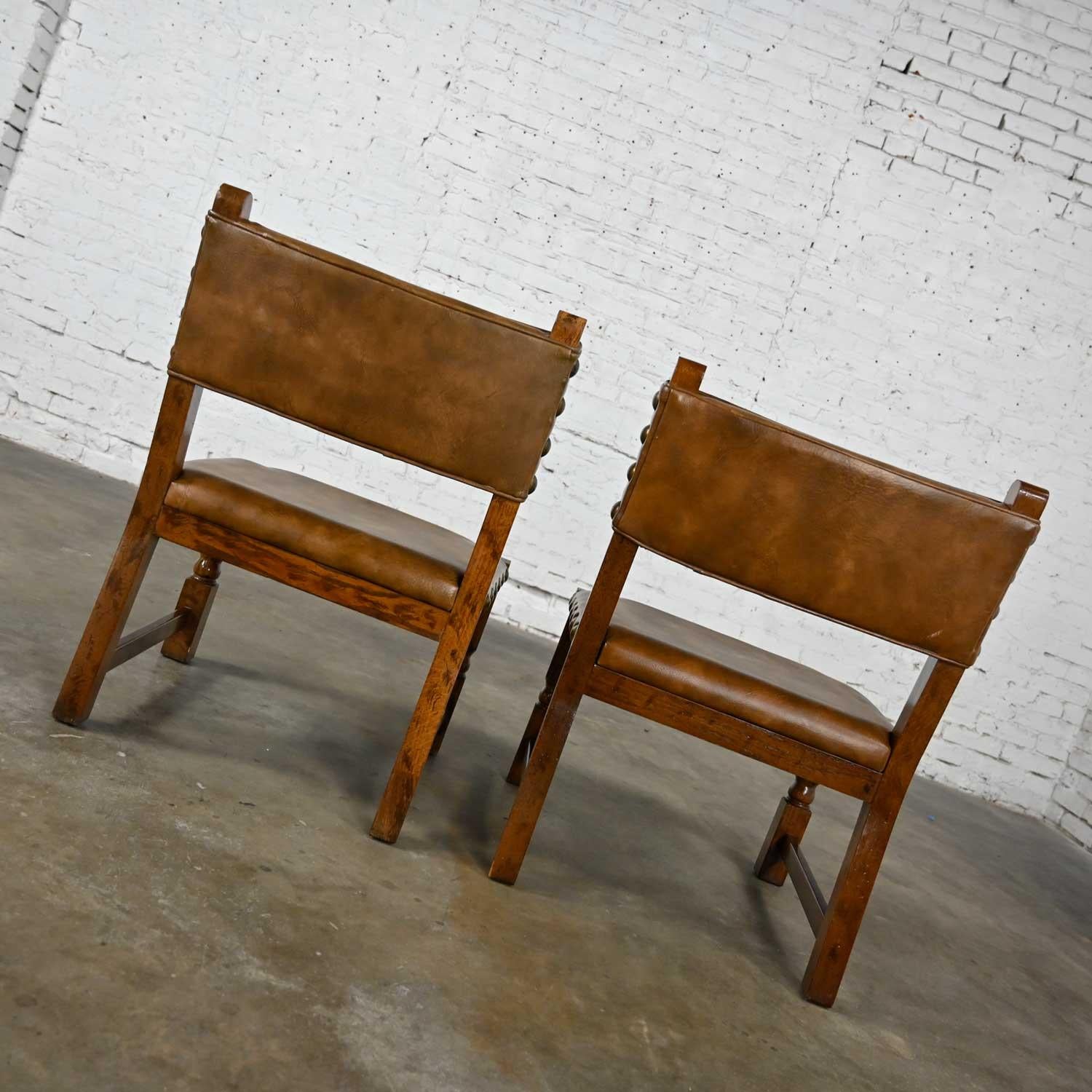 Vintage Spanish Revival Oak Pair of Chairs with Tooled Cognac Faux Leather Seat For Sale 2