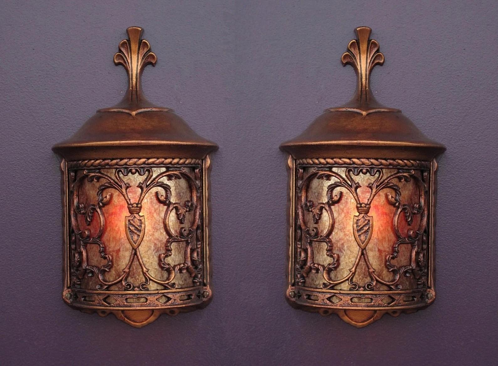 Priced Each, (not priced per pair). 4 available at time of listing.
Antique restored Spanish Revival wall sconces, refinished in an original color of antique golden. Delicate filigree surrounds the new-formed mica shade. Made of cast aluminum with