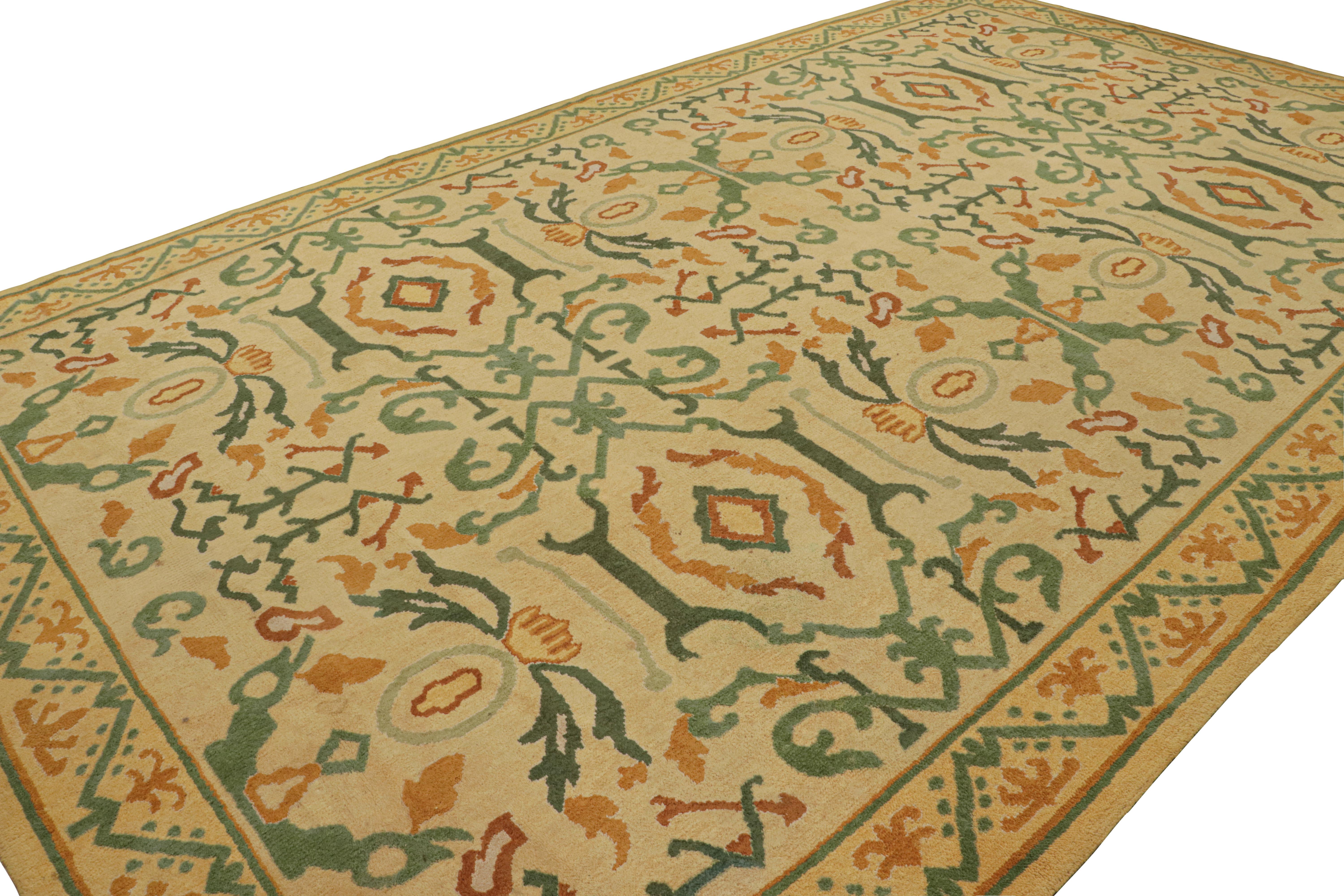 Hand-knotted in wool, this 11x19 vintage Spanish rug in gold features geometric patterns in green and orange that draw on Art Nouveau sensibilities. 

On the Design:

Admirers of the craft may note an inspiration from Art Nouveau sensibilities in