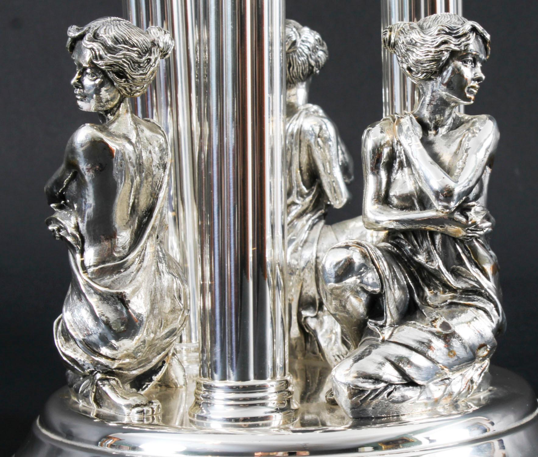 This is an impressive Spanish sterling silver Three Graces centrepiece - candelabra, by the Catalan Spanish Silversmiths Cunill Orfebres, late 20th Century in date.

This wonderful centerpiece bears the sterling silver mark 925, and has three candle