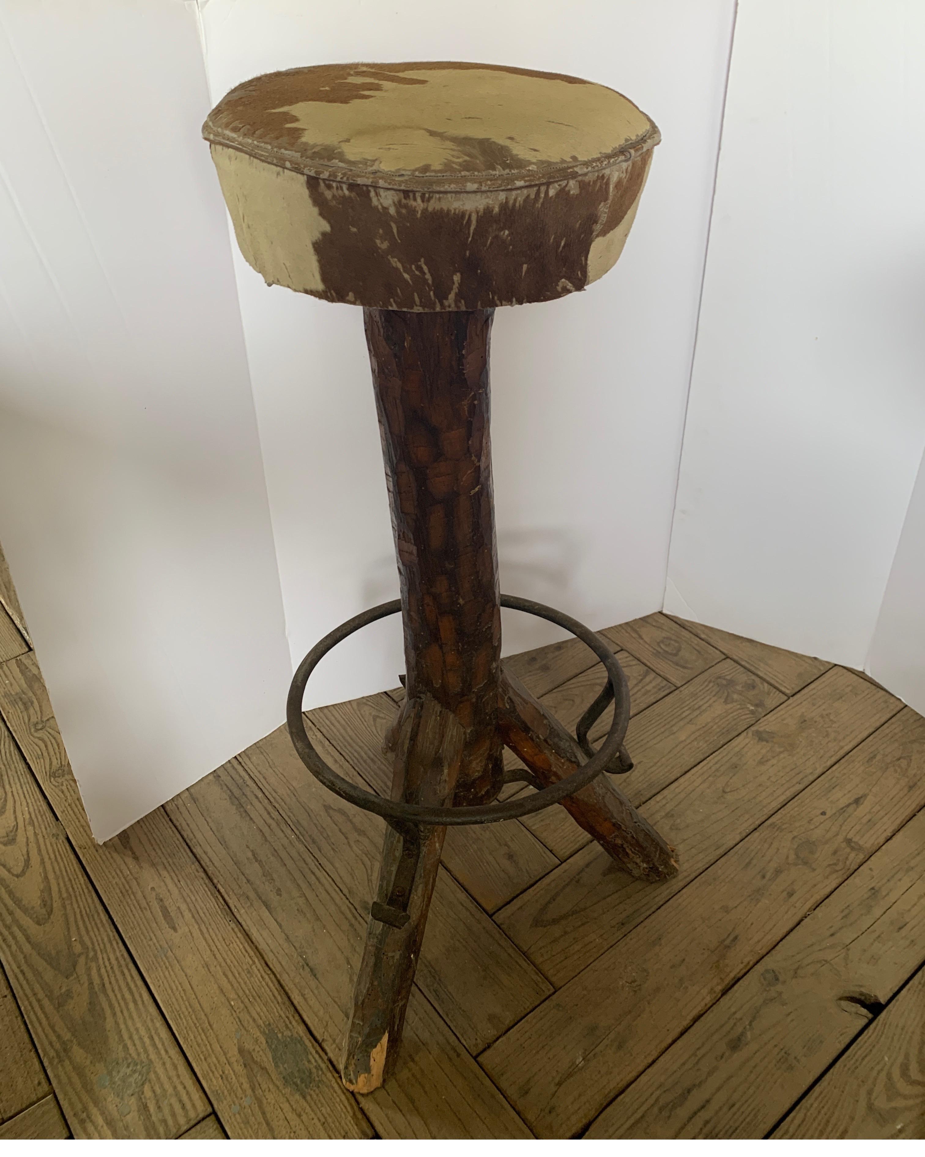 These are super cute rustic barstool with real cowhide covered seats from Spain. They are great for that lodge or country house feel. Seat is 12.5 diameter and bottom base is 14.5 width x 33 tall.
