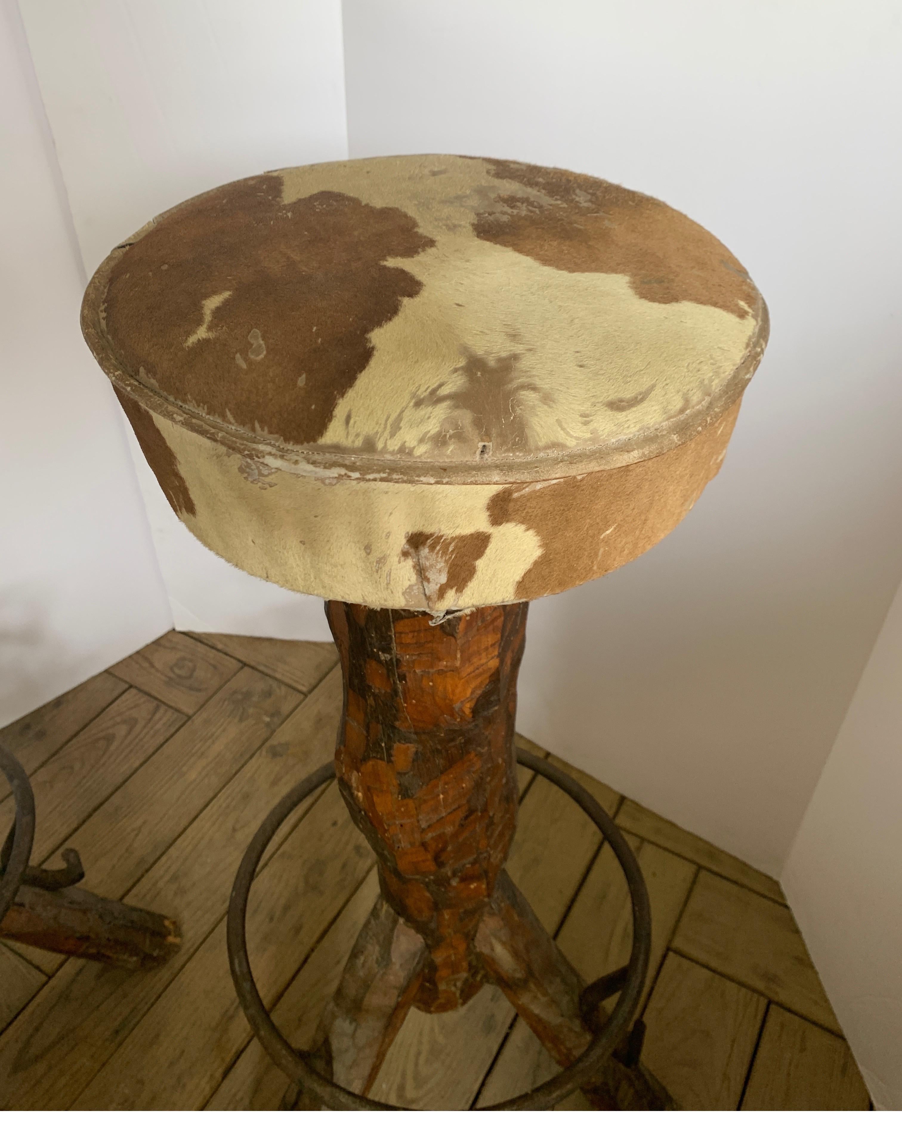 Vintage Spanish Stump Barstools with Cowhide Seats In Good Condition For Sale In Houston, TX