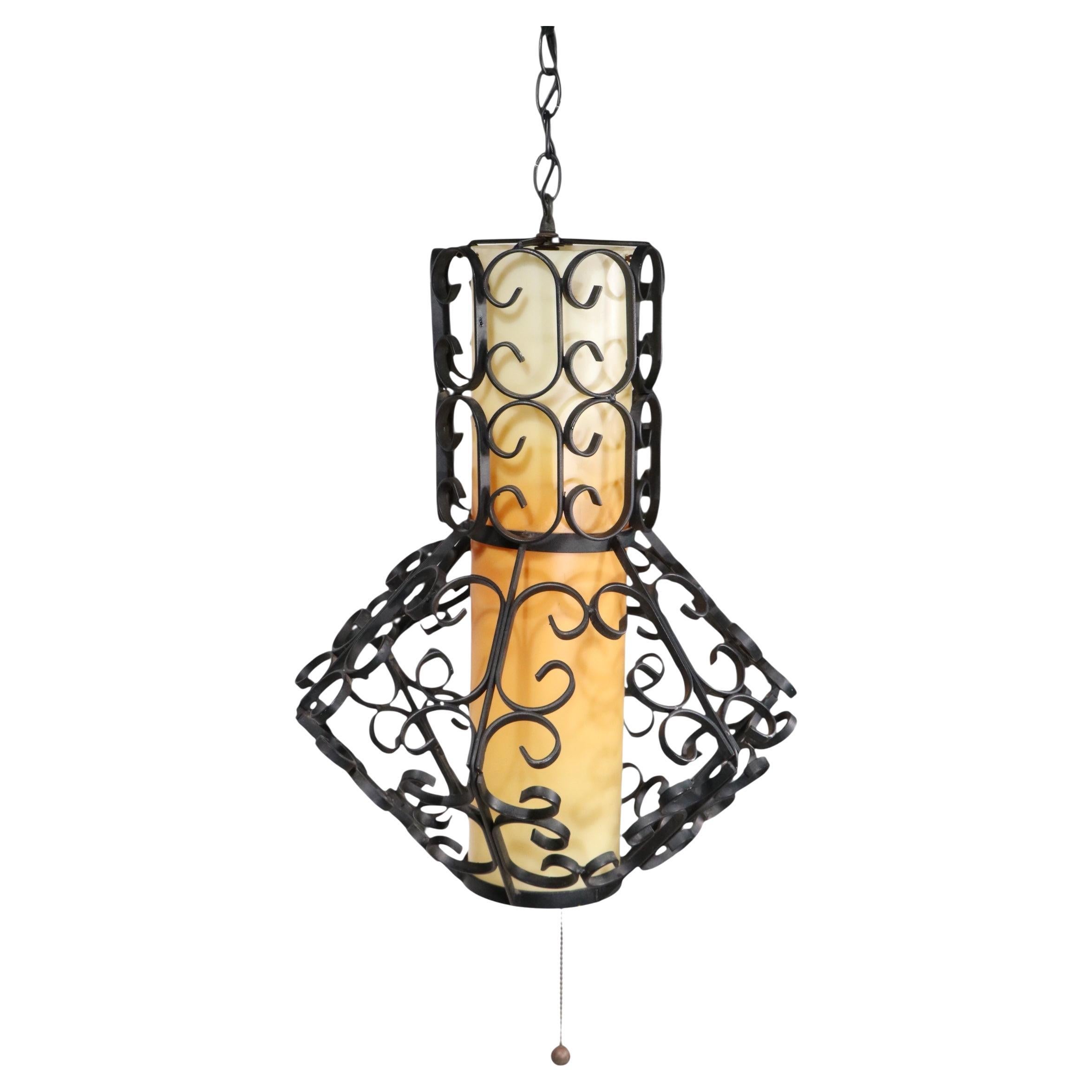 Vintage Spanish Style 1970
s Wrought Iron Swag Light Chandelier att. to Umanoff For Sale