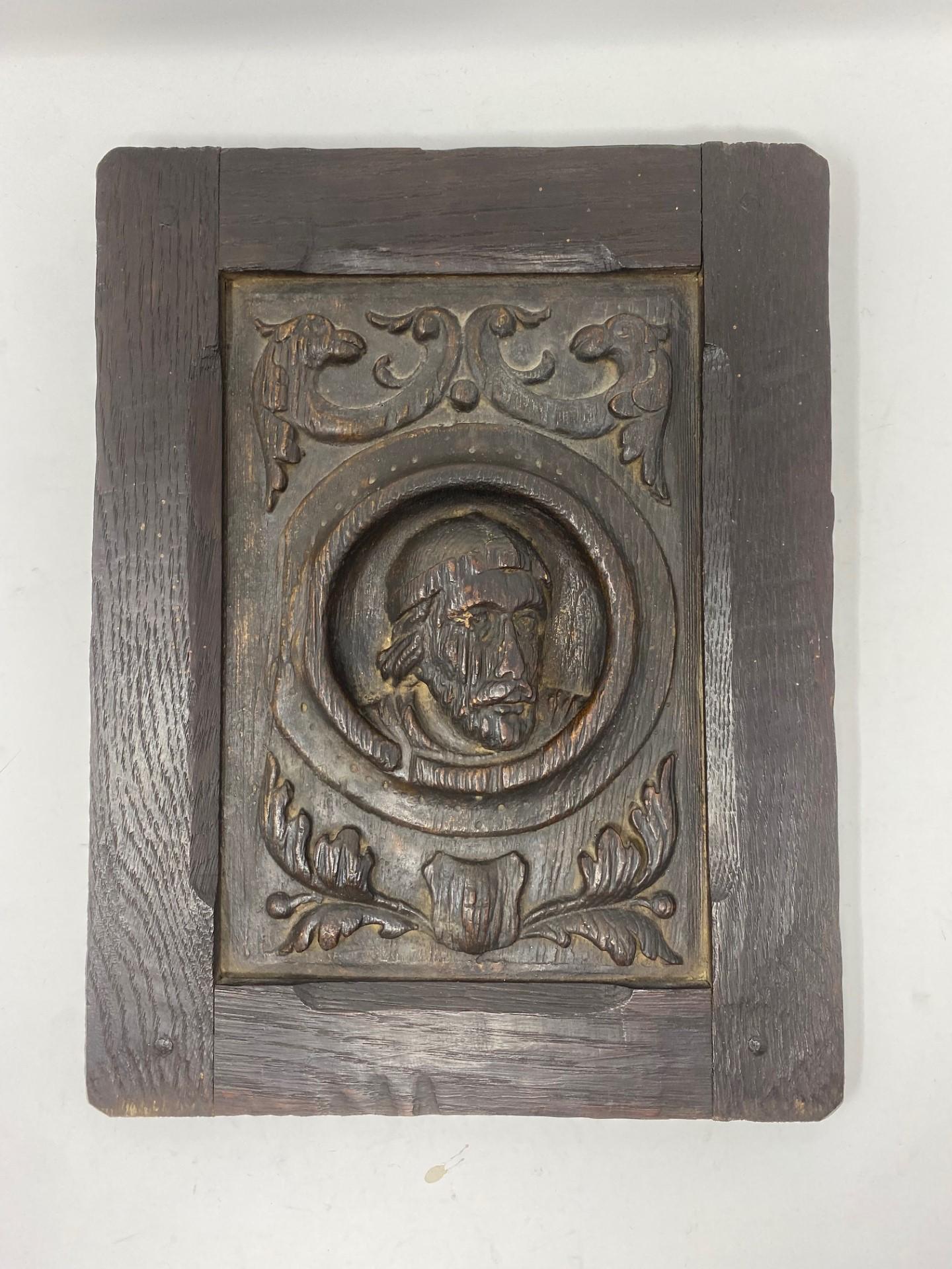 Beautiful vintage wood and ceramic art panel in the style of a classical religious art carving.  The terracota figurative panel shows the head of a male figure that resembles a clergyman that is centered by baroque style details.  The panel itself