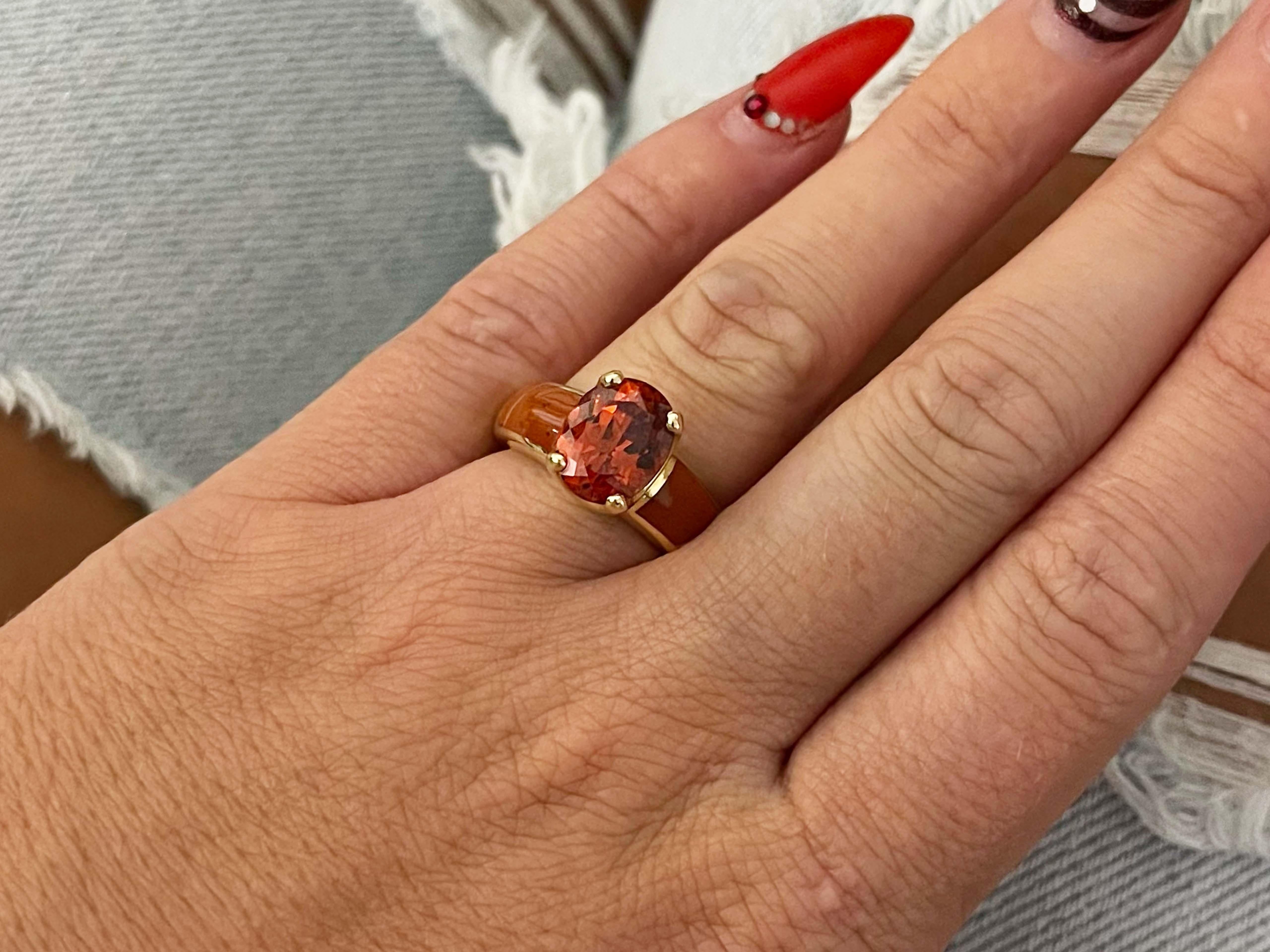 Ring Specifications:

Style: Ring

Metal: 14k Yellow Gold 
​
​Gemstone: Spessartite Mandarin Garnet
​
​Gemstone Carat Weight: 4.50 carats
​
​Gemstone Measurements: 11 x 8.70 x 5.50 mm

Ring Size: 6.5 (can be resized for a small fee)

Ring Weight: