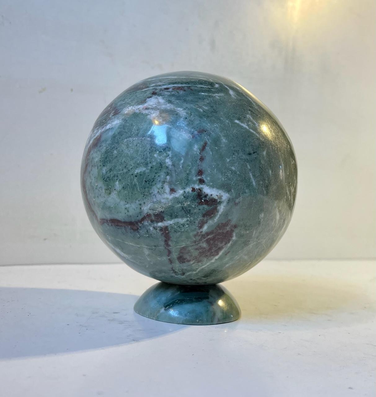 Artisan made sphere with matching stand in green Fuchsite crystal. Mined, crafted and polished in Madagascar ca 1980. Measurements: H: 14 cm, D: 12 cm. Weight: over 2kg. Fuchsite chert also commonly known as 