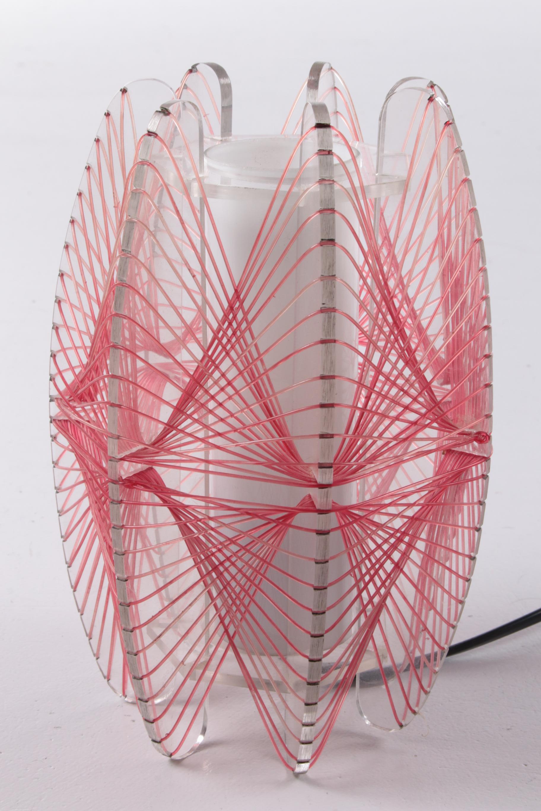 Vintage spider web table lamp 1960s


This is a beautiful table lamp made of plastic wire also called spinnerag.

The lamp was probably made in the Czech Republic in 1960.

Beautiful as a mood light in a corner where you are just missing a