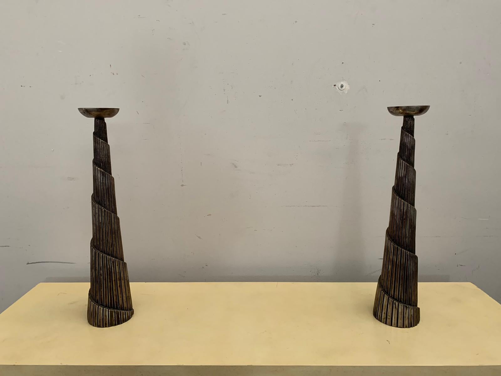 Pair of spiral resin candlesticks covered with metal leaf, 1980s. Unknown artist.