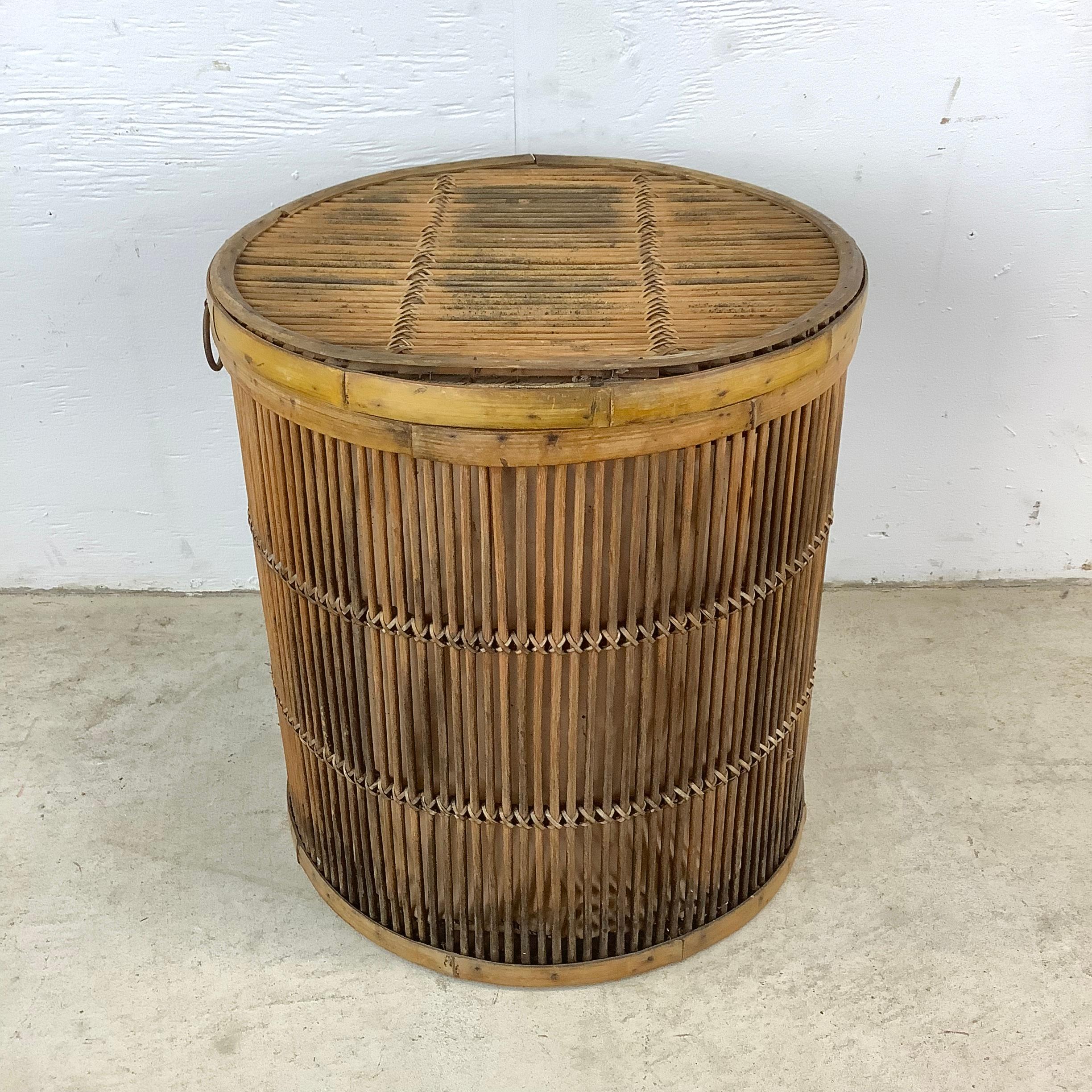 Embrace the allure of vintage elegance with this exquisite vintage pencil reed basket, a unique piece that combines functionality with classic design. This handcrafted basket comes complete with a snug-fitting lid, making it a perfect blend of