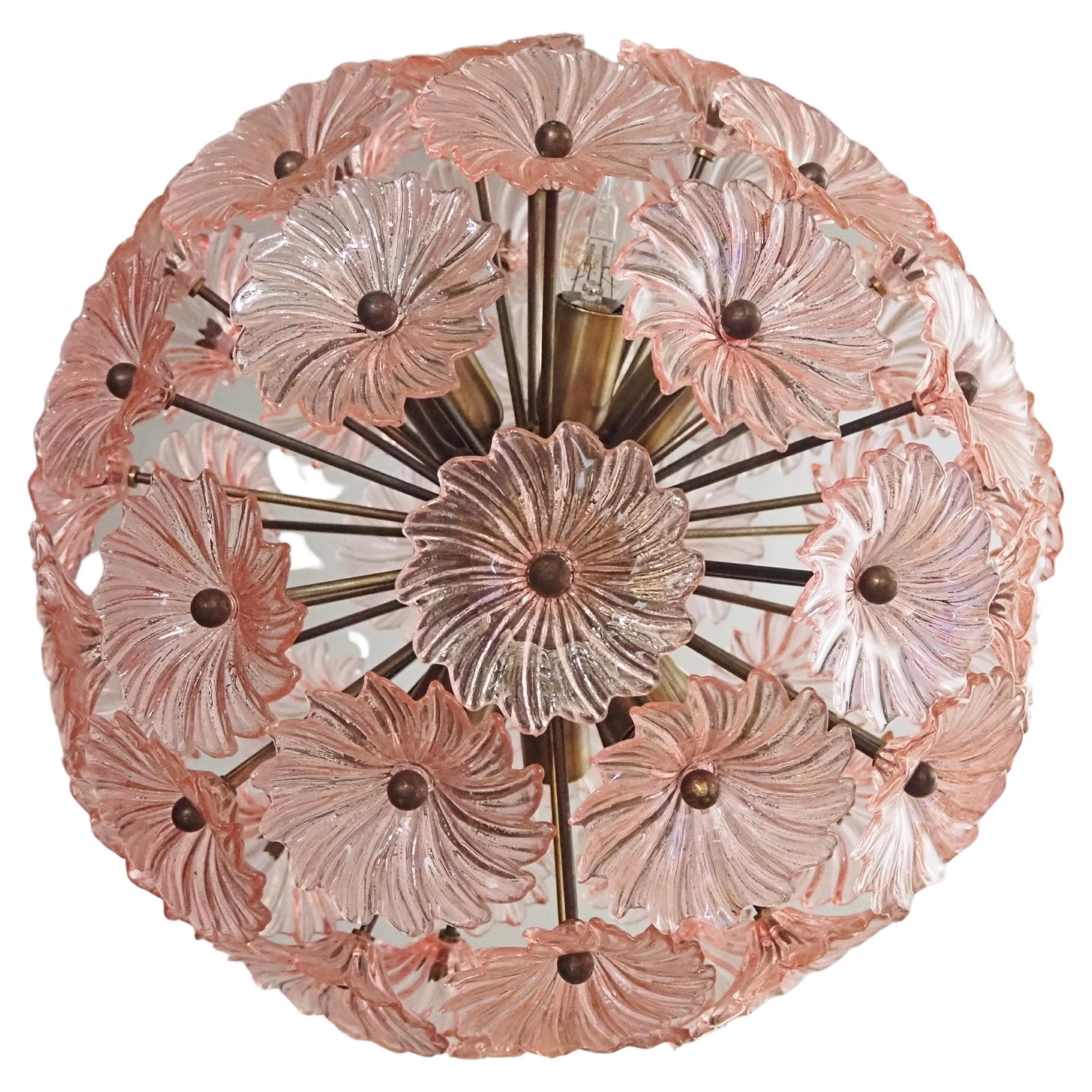 Sputnik space age Italian vintage crystal chandelier made by 51 pink glasses in a burnished brass metal frame. Elegant lighting object.
Period: late 20th century
Dimensions: 39 inches (100 cm) height with chain; 17.70 inches (45 cm) height without