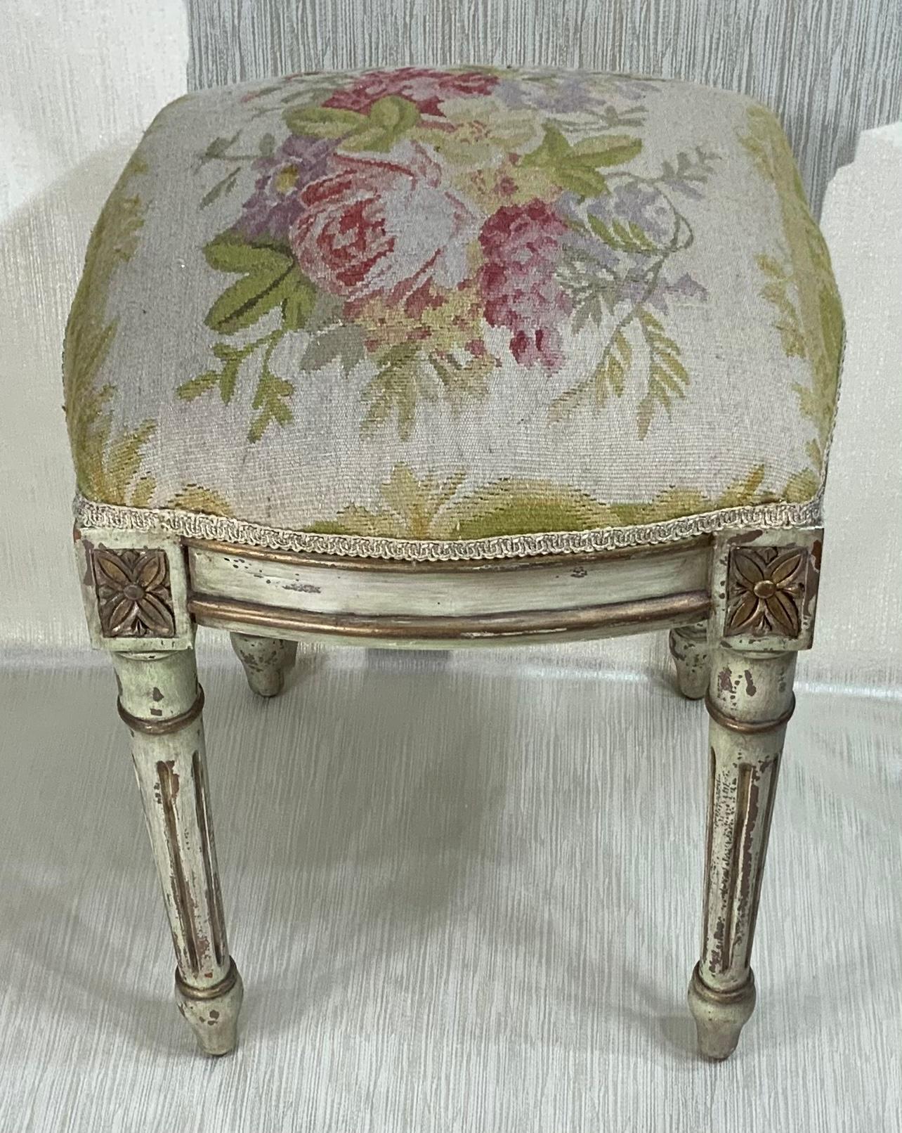This elegant square stool made of hand carved wood, hand painted, with beautiful muted floral motif antique handwoven Aubusson French tapestry.