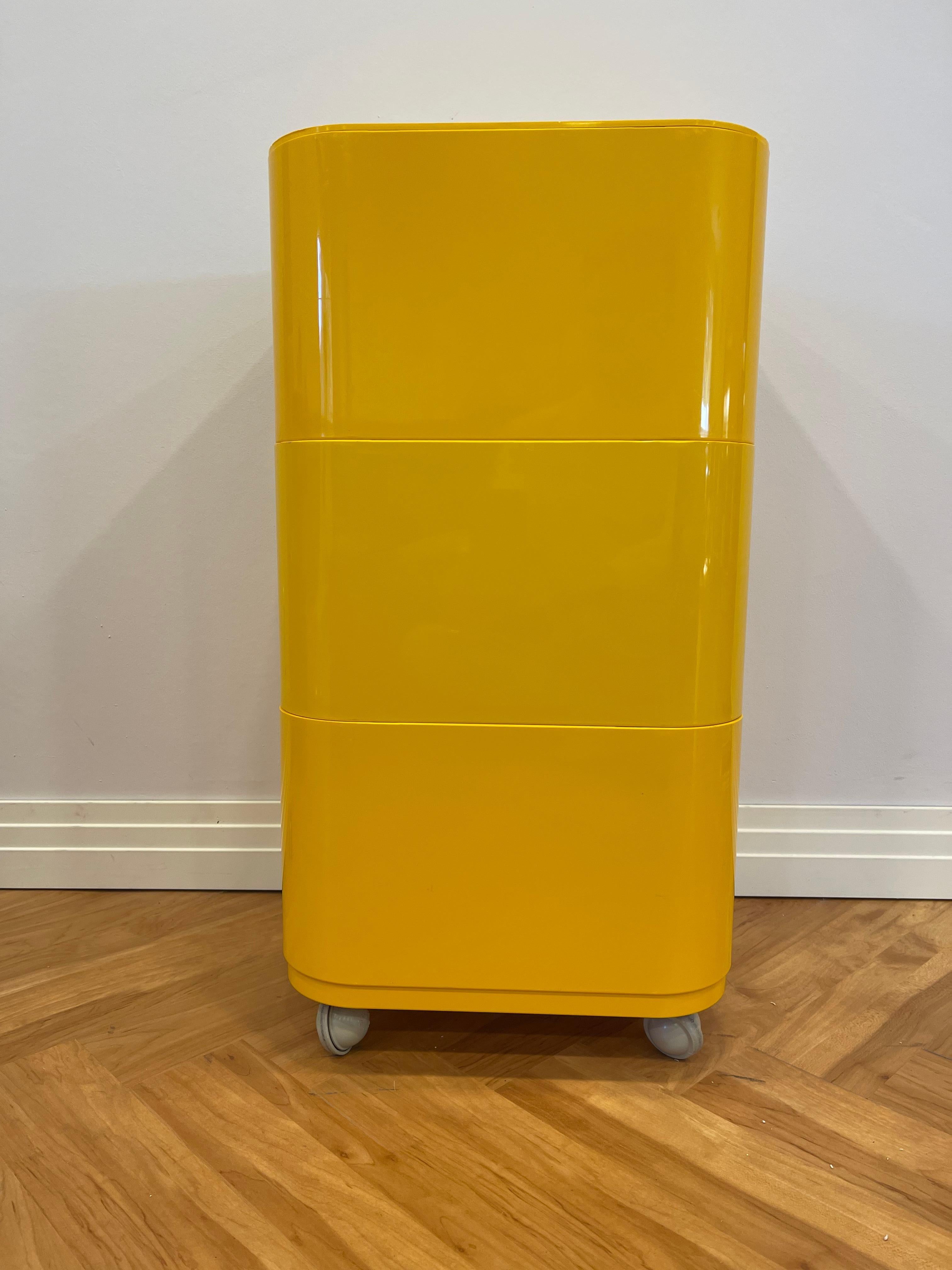 3-tier square vintage componibili in rare yellow plastic. On casters.