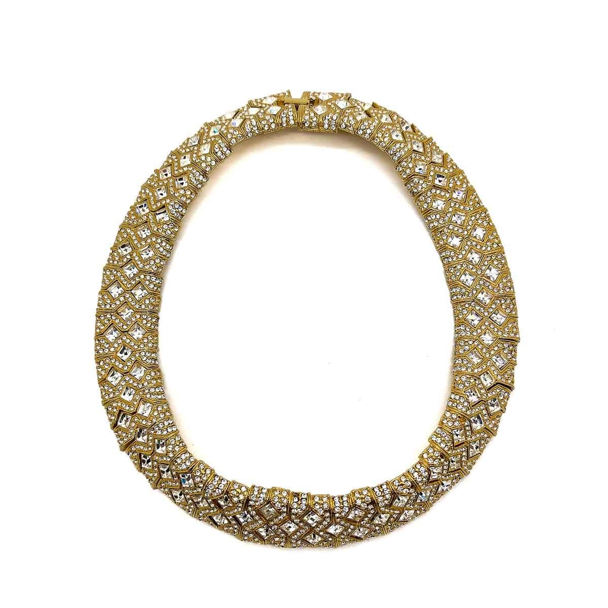 A super glamorous Vintage Square Crystal Collar. A solid chunky collar adorned with  pave set crystals including fancy square cuts and chatons. A perfect forever in style piece that will easily elevate your style every wear.
An unsigned beauty. A