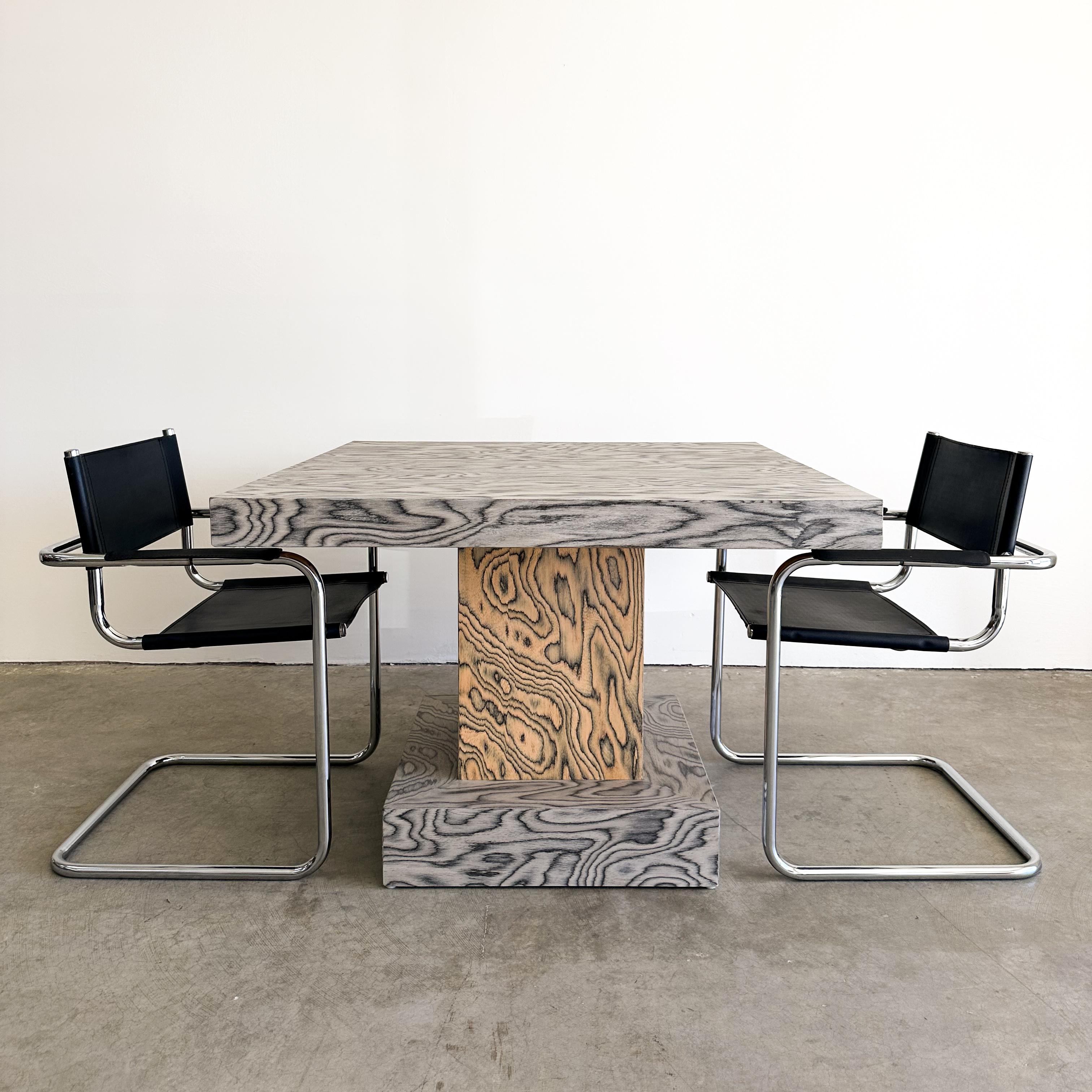Vintage Square Dining Table/Games Table featuring Ettore Sottsass Veneer.

The vintage table has been re-veneered with the original Ettore Sottsass pattern from 1985.
ALPI manufactures the distinctive veneer.
It has been sealed with a satin finish