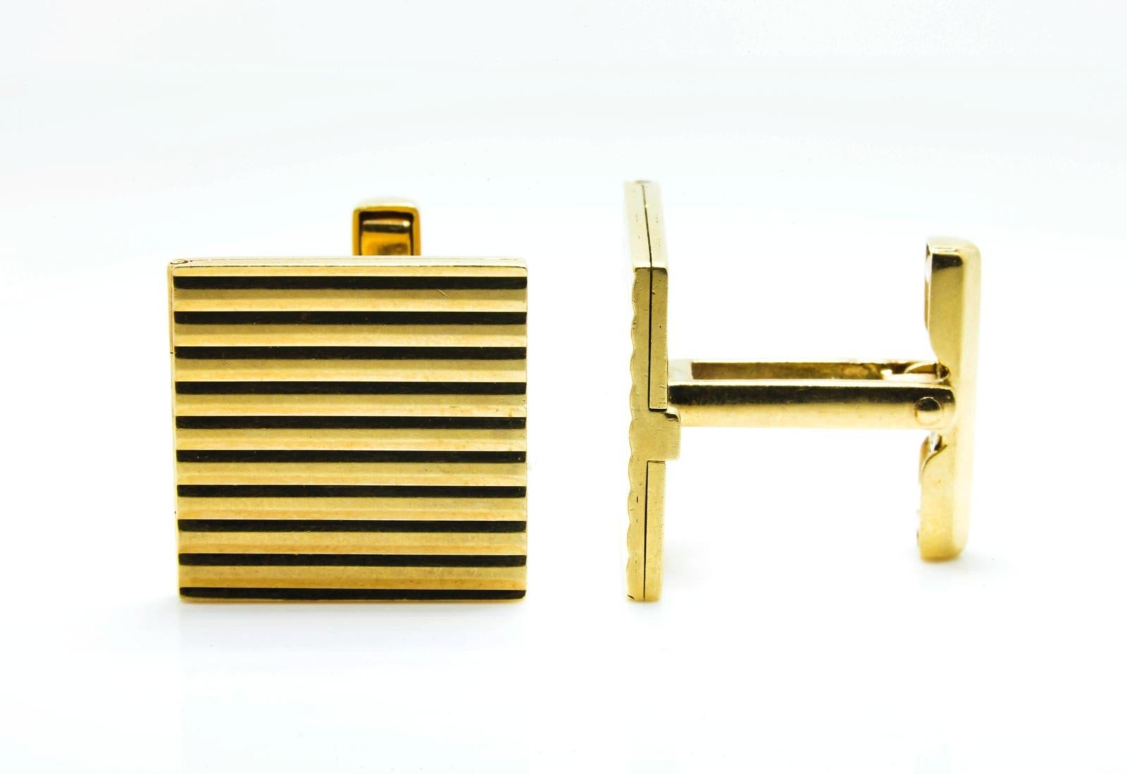 These are particularly unique 14KT yellow gold cufflinks as they also serve as a photo album.  The front of the 3/4 by 3/4 inches squares are enhanced with ridges, each cufflink open up to reveal space for two photos.  These are the original
