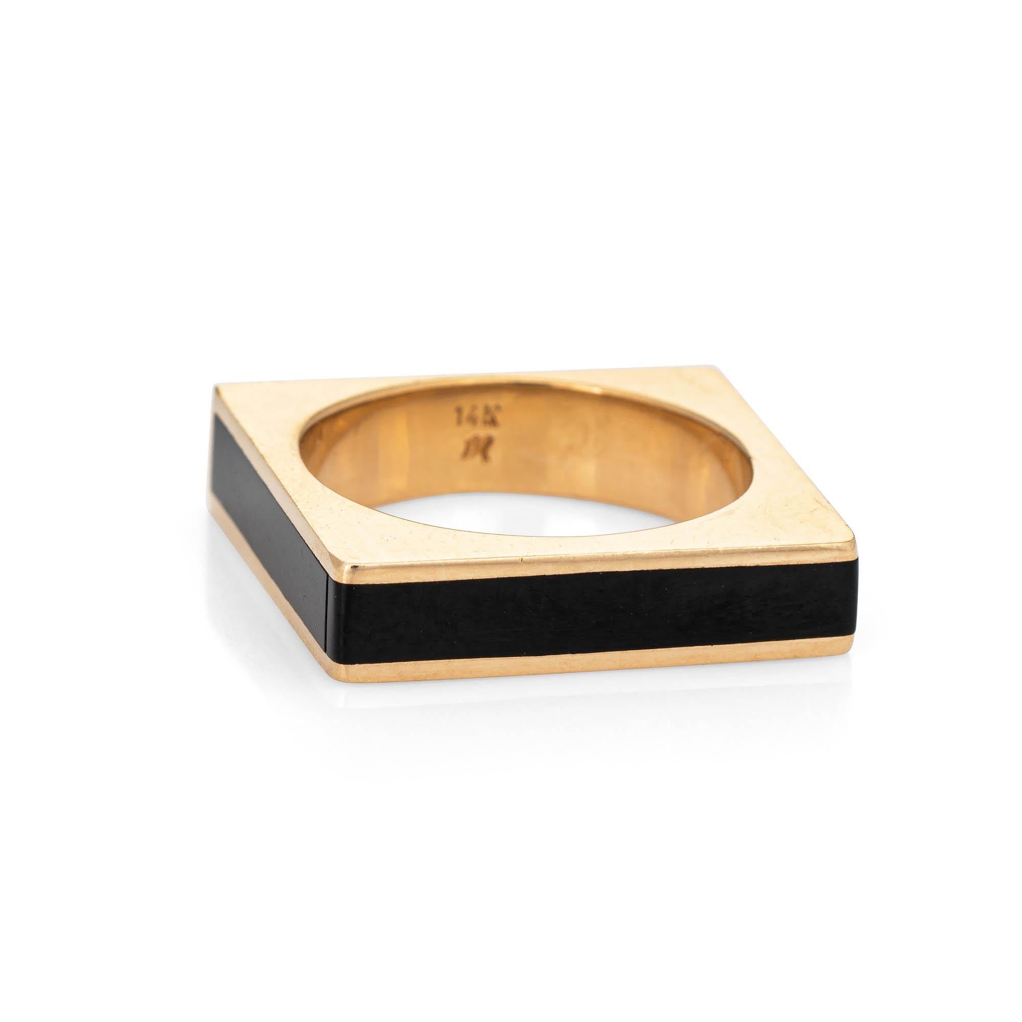 The band is inlaid with black onyx measuring 3mm wide (in excellent condition and free of cracks or chips).
The striking square ring features black onyx inlaid into three sections of the band. The ring is great worn alone or layered with your fine