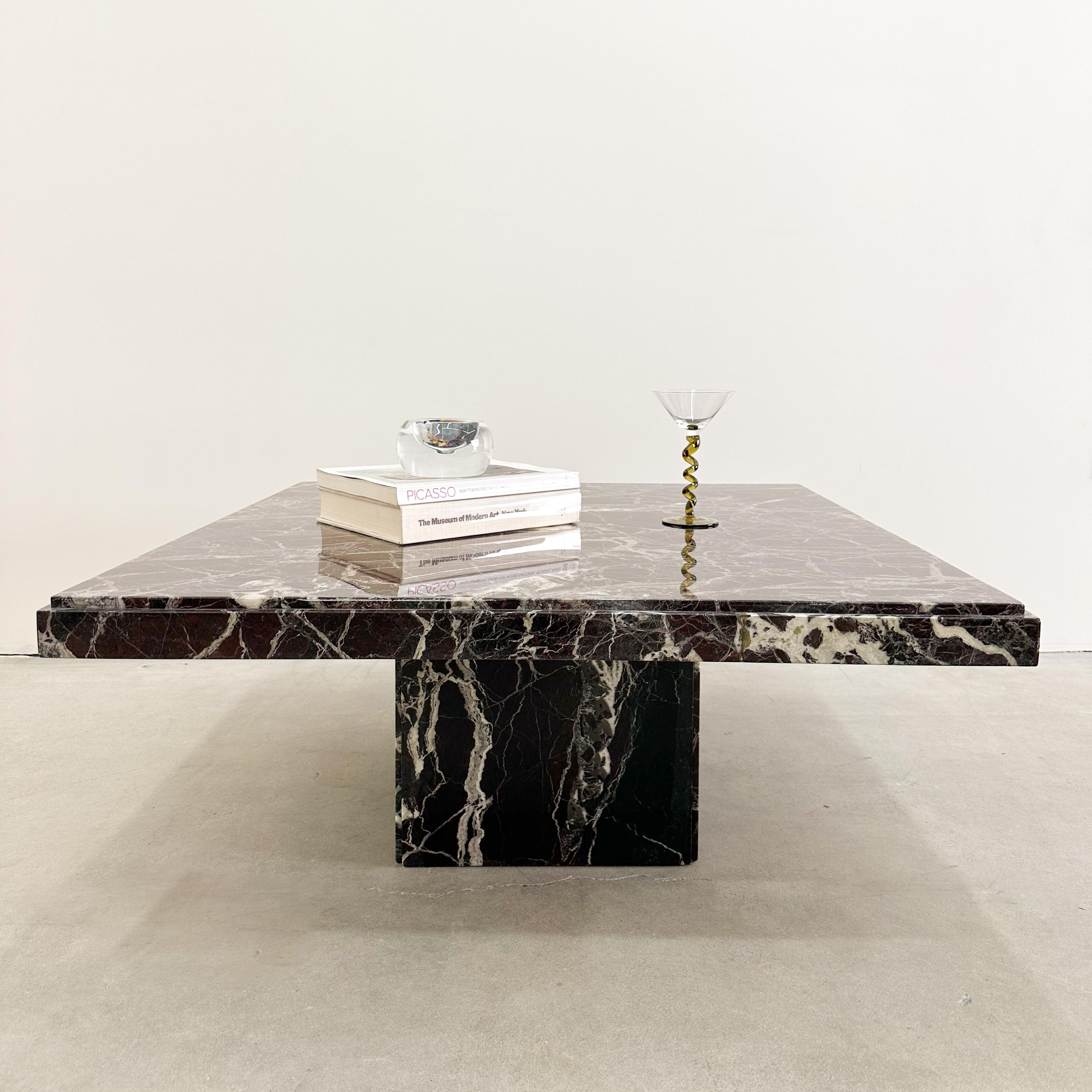 Vintage Square Rosso Levanto Marble Coffee Table.

The table is made out of solid marble. It comes in two pieces. The table top sits on the base.

Marble: Rosso Levanto

Color: Burgundy, wine, cream, and a dash of chocolate brown.

Measurements: