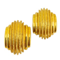 Orecchini a clip d'epoca St. Johns in oro massiccio di design