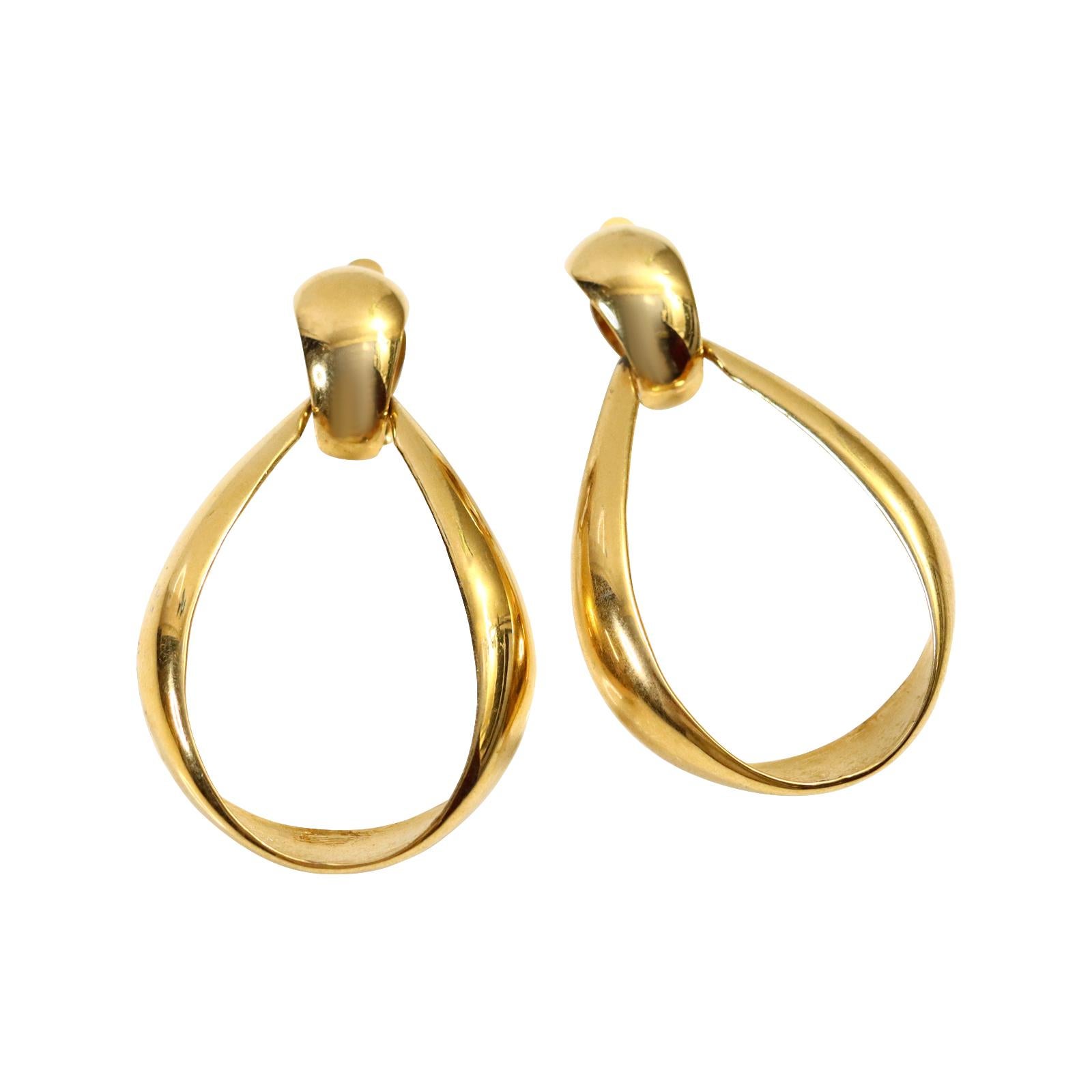 Vintage St John Gold Tone Hoop Earrings Circa 1990s. These are the forever type of earrings that never go out of style. St John made some great jewelry in the 1980s/1990s.  These front facing gold hoops look so chic and stunning with everything. No