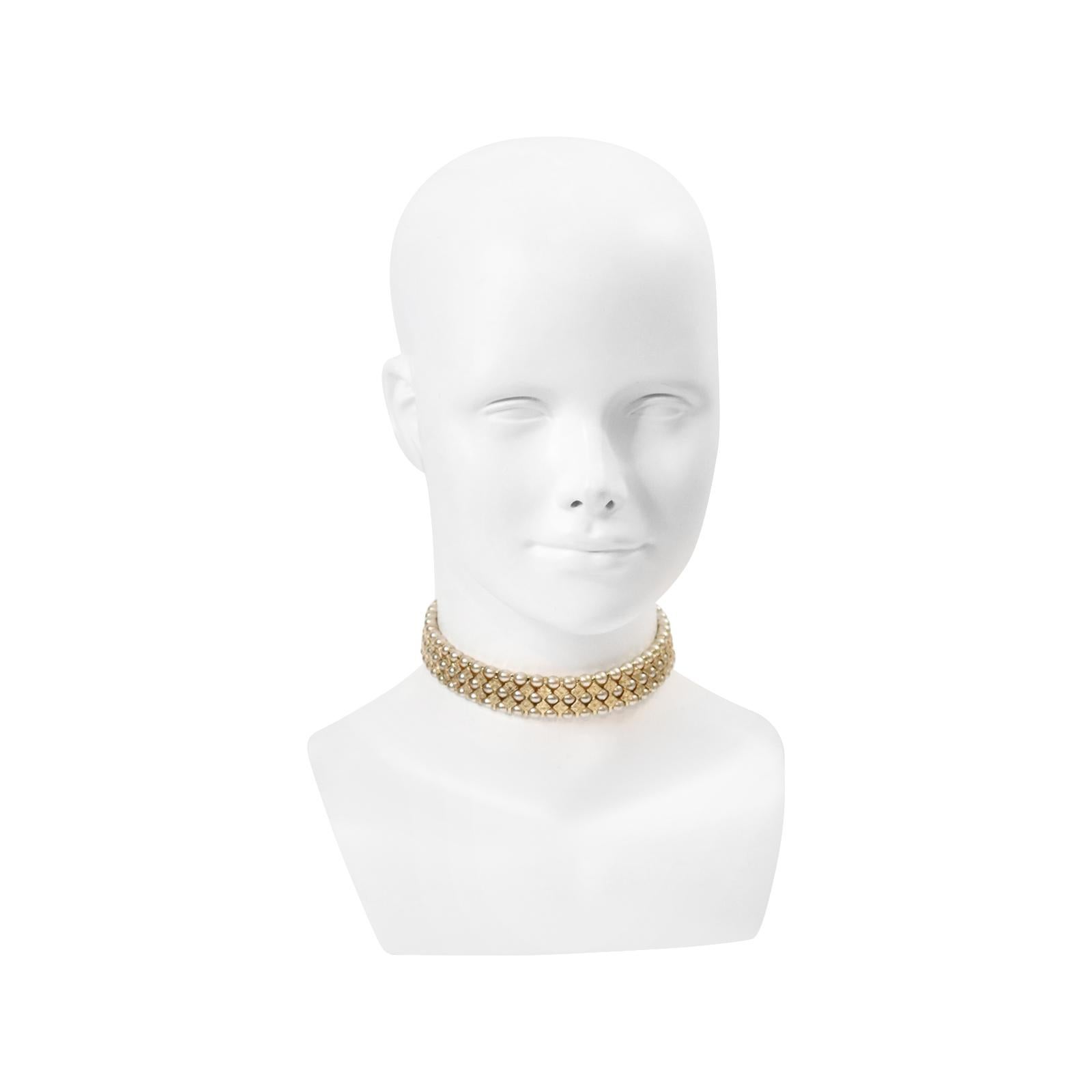 Vintage St John Gold Tone With Faux Pearls Choker circa 1990s. This fantastic choker has some stretch to it. It is well-made and substantial, and it will look great when you wear it. St. John made gorgeous and very well-made jewelry in the day. The