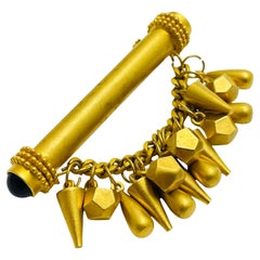 Vintage ST JOHN matte gold tone etruscan dangle charms designer brooch