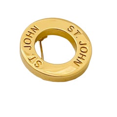 Vintage ST JOHN signed gold tone designer brooch Vintage ST JOHN signed gold tone designer brooch