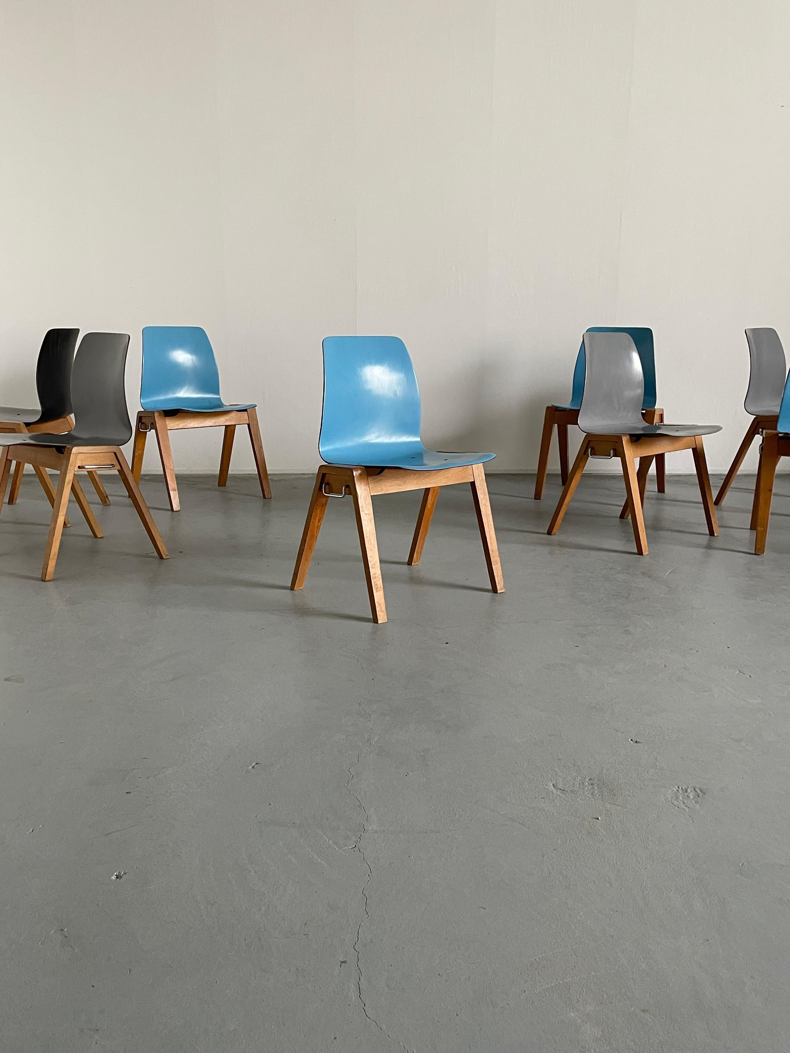 Mid-Century Modern stackable dining chairs or visitor chairs with a wooden base and molded lacquered plywood seat, a technology invented by the manufacturing company Flötotto. Produced during the 1960s.
High production quality.

Real piece of