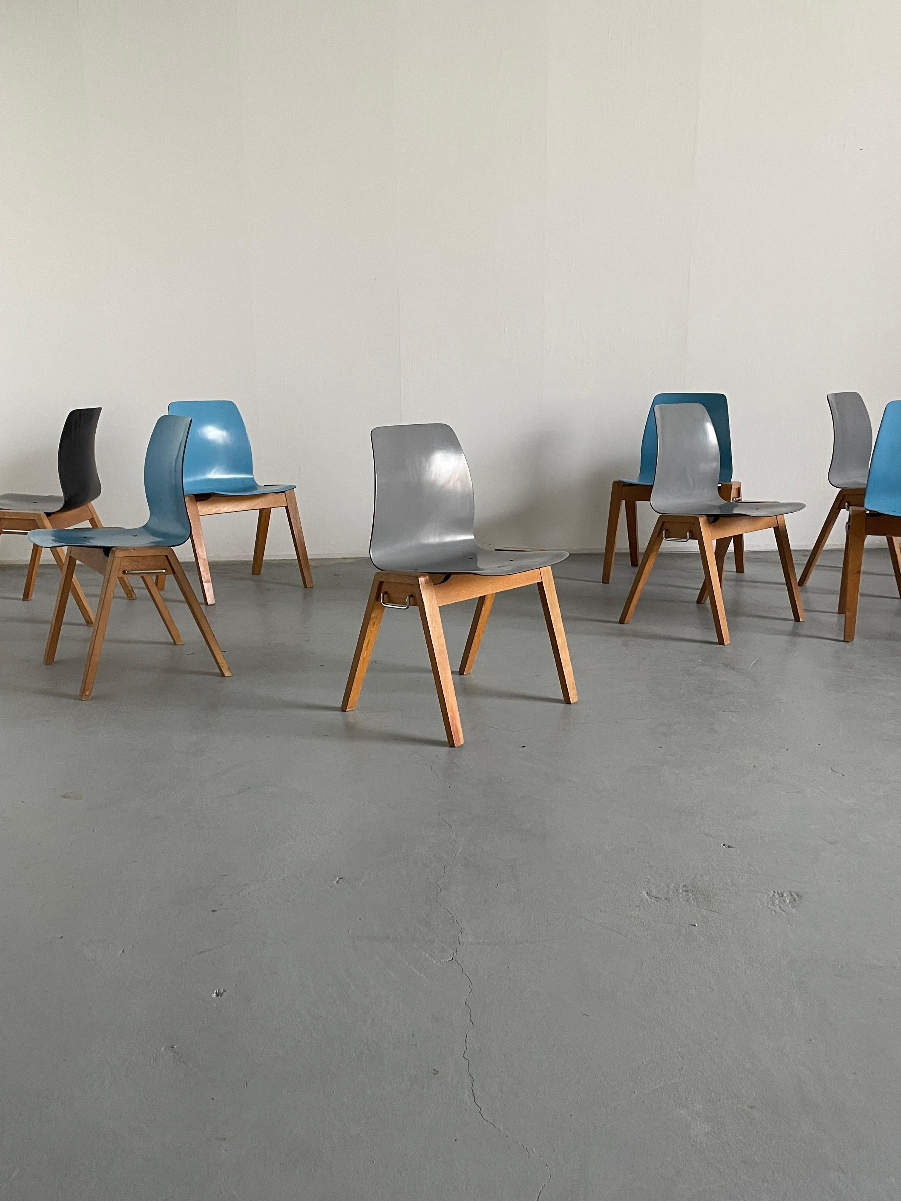 Mid-Century Modern stackable dining chairs or visitor chairs with a wooden base and molded lacquered plywood seat, a technology invented by the manufacturing company Flötotto. Produced during the 1960s.
High production quality.

Real piece of