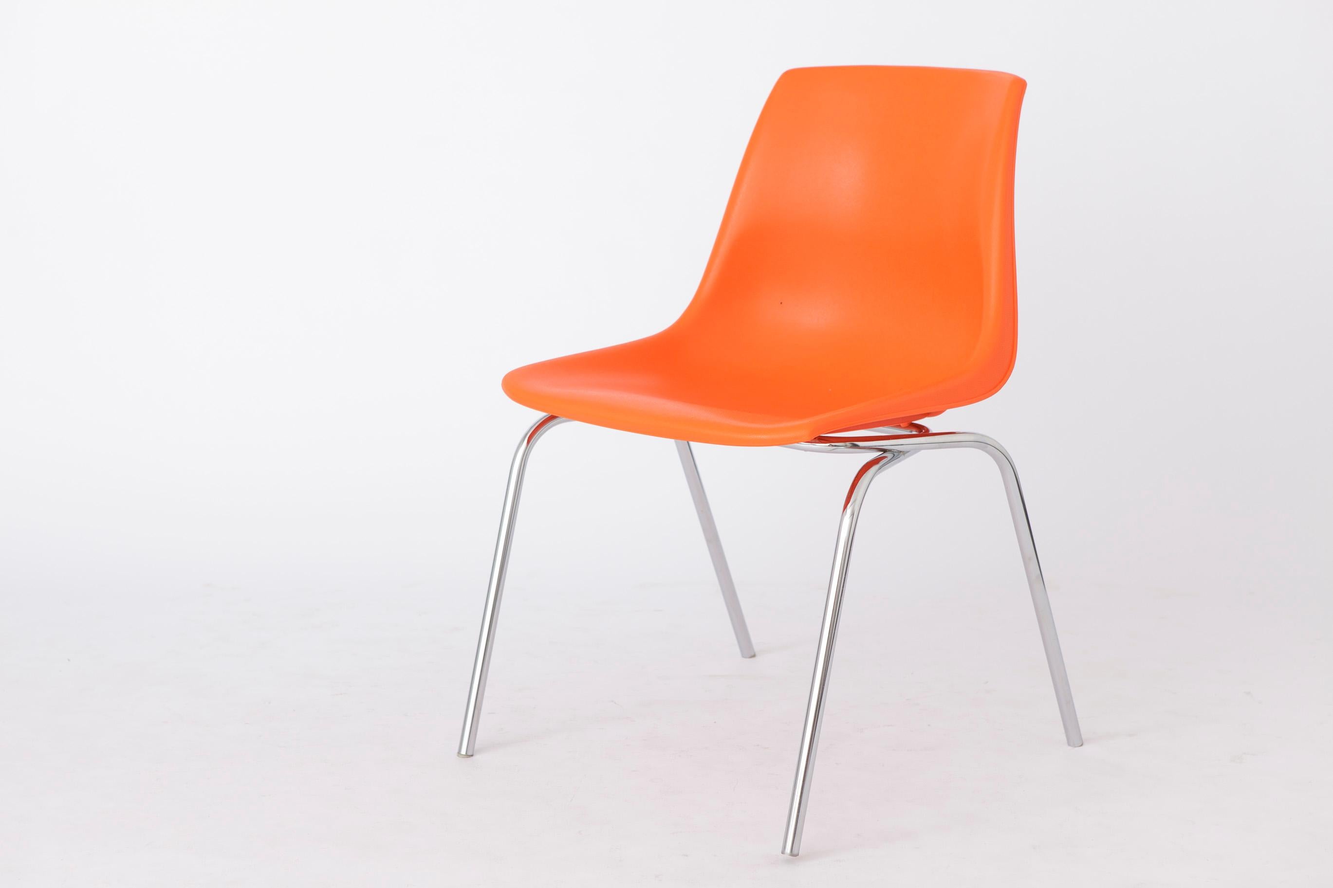 Set of 4 Vintage Plastic chairs. 
Unknown manufacturer. 

Good condition. Metal chrome feet and plastic seat. 
Displayed price is for 4 chairs. 