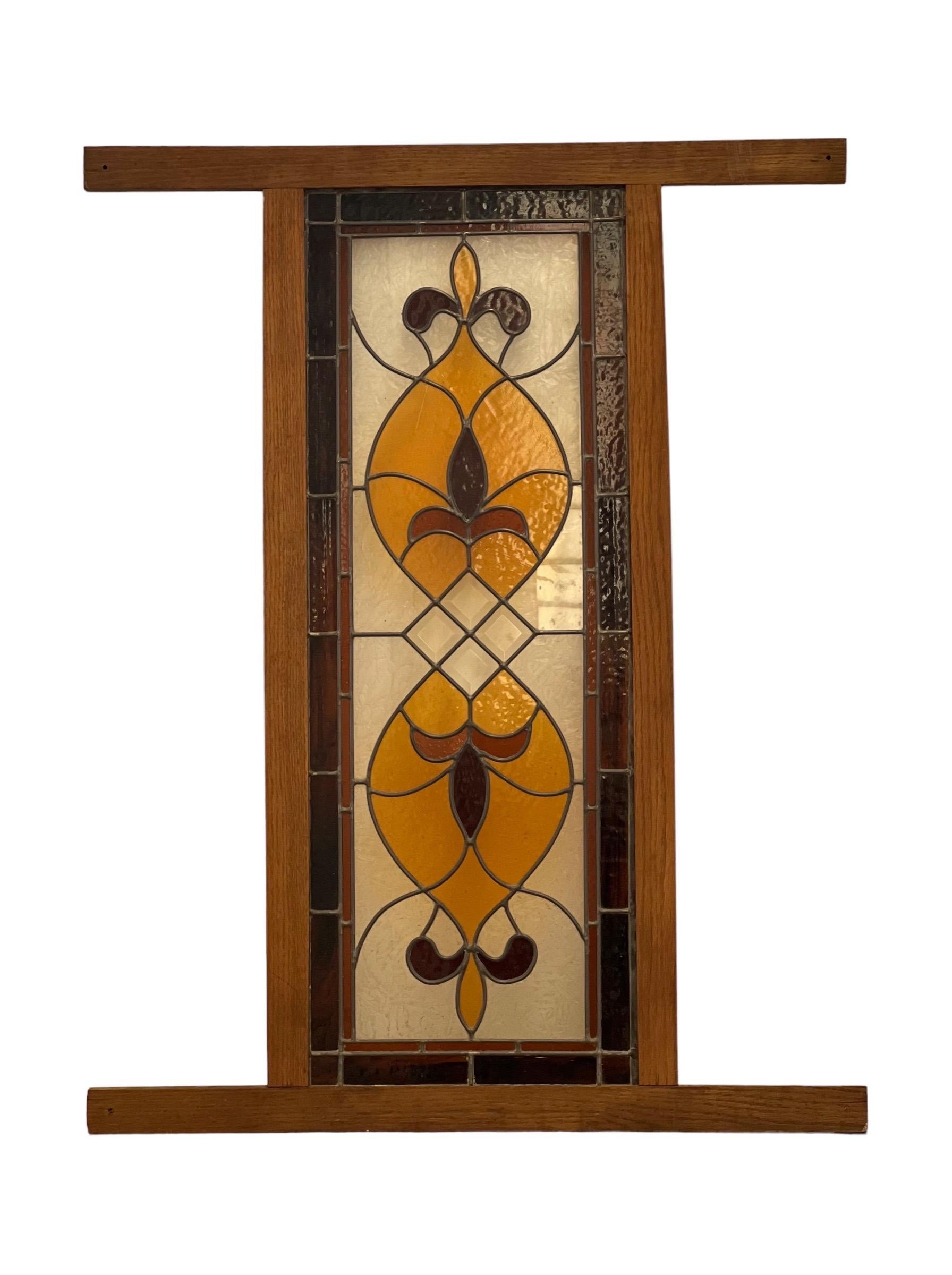 Vintage stained glass

Dimensions. 33.5 W ; 43 H.