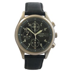 Montre vintage en acier inoxydable avec cadran noir Pulsar Chronograph 100M