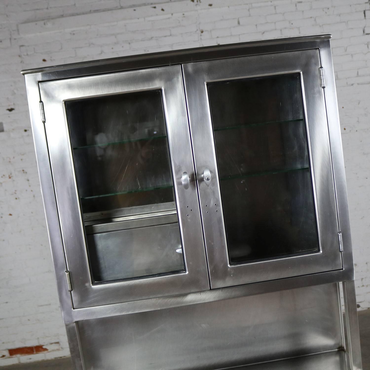 Vintage Stainless Steel Cupboard Industrial Medical Fischman Step Back Cabinet In Good Condition In Topeka, KS