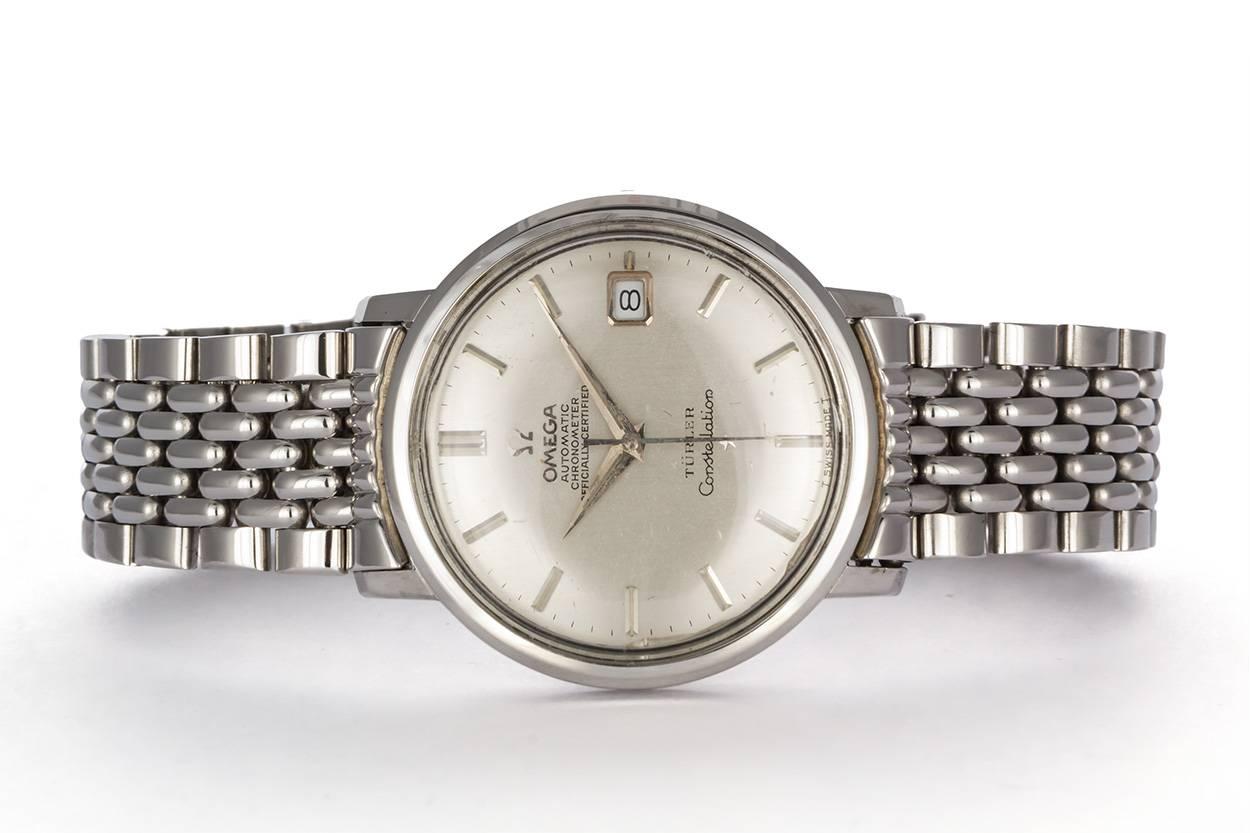 We are pleased to offer this Vintage Stainless Steel Omega Constellation Mens Watch. It features an automatic movement set in a 36mm stainless steel case. It will fit up to a 7.75