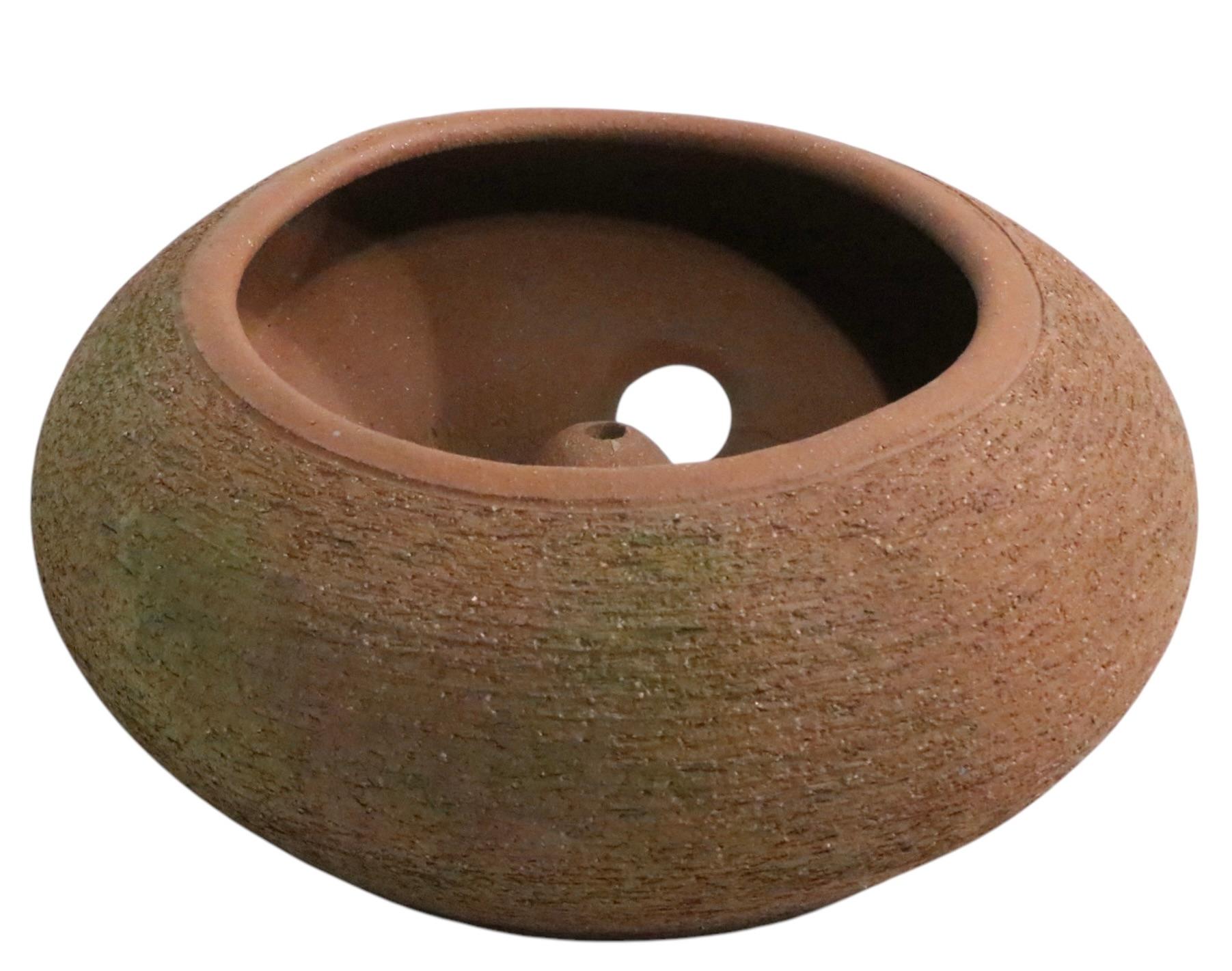 Exceptional Mid Century, California Modern garden hose pot, by noted potter Stan Bitters, for Hans Stumpf, circa 1970's. This example is in very fine, original, undamaged condition, signed on the interior wall, as shown. Sophisticated modernist