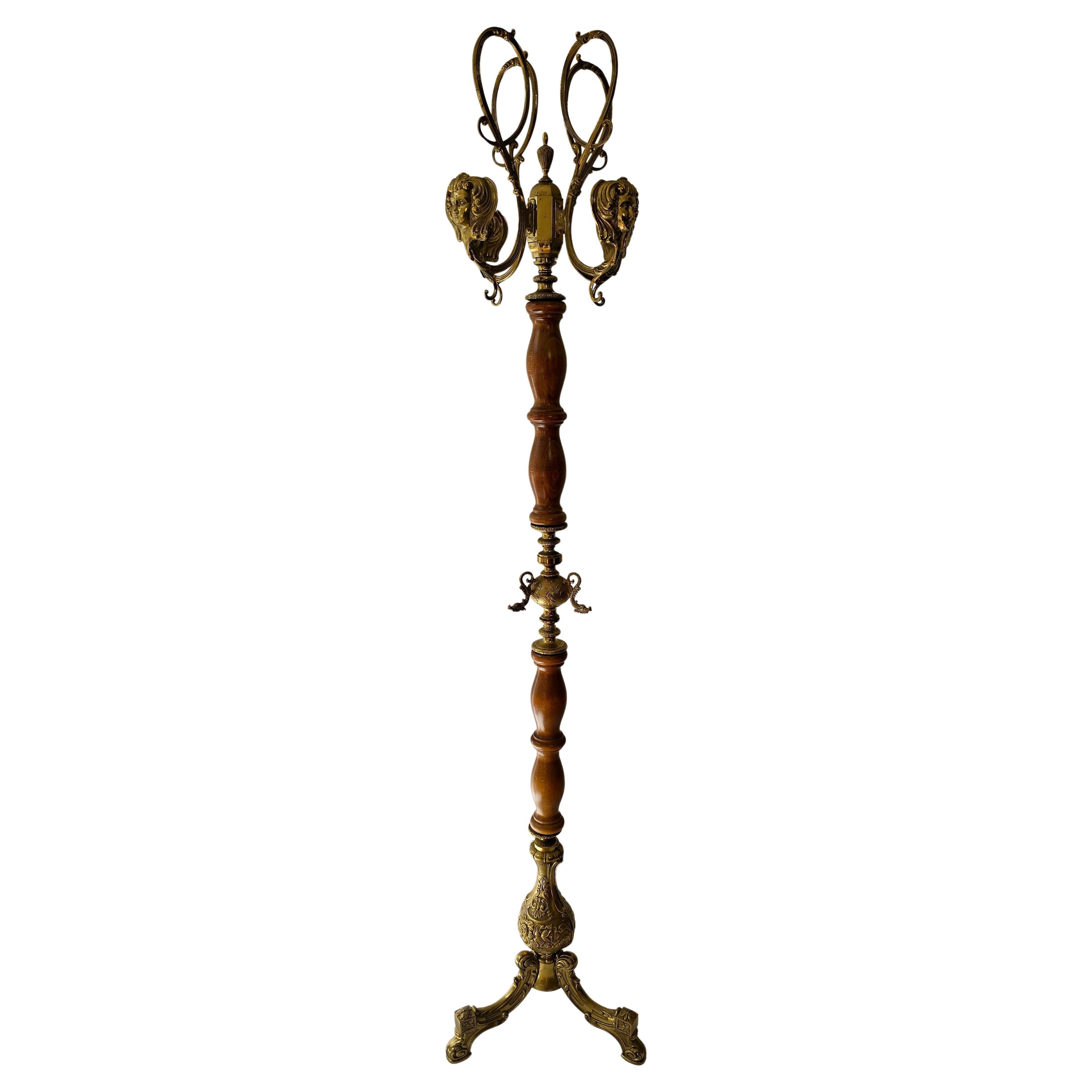 Vintage Standing Coat Rack, Wood and Gilt Brass, 1960s–1970s

A highly decorative vintage standing coat rack, crafted in the 1960s–1970s in the style of 19th century Napoleon III and early Art Nouveau. The piece combines a turned wooden column with