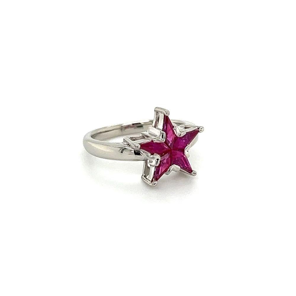 Simply Beautiful! Vintage Star Pattern Custom Calibre Ruby Gold Ring. Star pattern Hand set with Custom Calibre Rubies, weighing approx. 0.83tcw. Hand-crafted 18K White Gold mounting. Ring size: 4.5, we offer ring re-sizing. The ring epitomizes