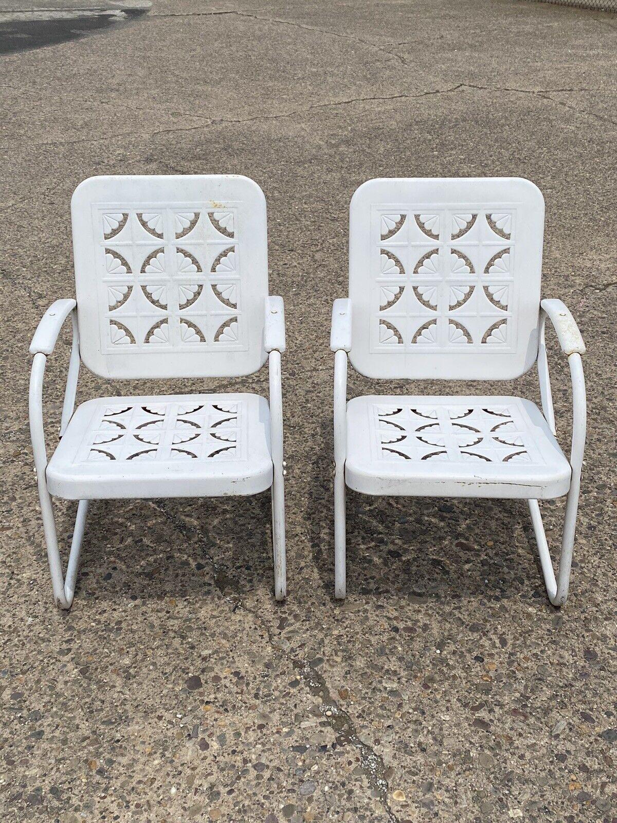 Vintage Starburst Pie Crest Metal Outdoor Patio Springer Lounge Chairs - a Pair. Circa Early to Mid 20th Century. Measurements: 35
