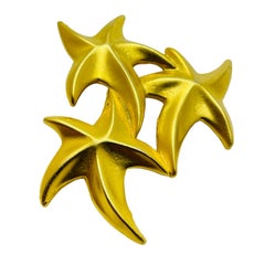 Broche de créateur vintage étoiles en or mat