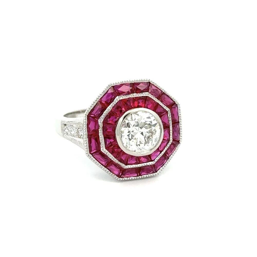 Simply Beautiful! Diamond and Ruby Double Octagon Platinum Statement Cocktail Ring. Centering a securely nestled Hand set 1.23 Carat Old European Cut Diamond. Surrounded by fine Red Rubies, weighing approx. 2.60tcw and 0.12tcw Round Diamonds. Hand